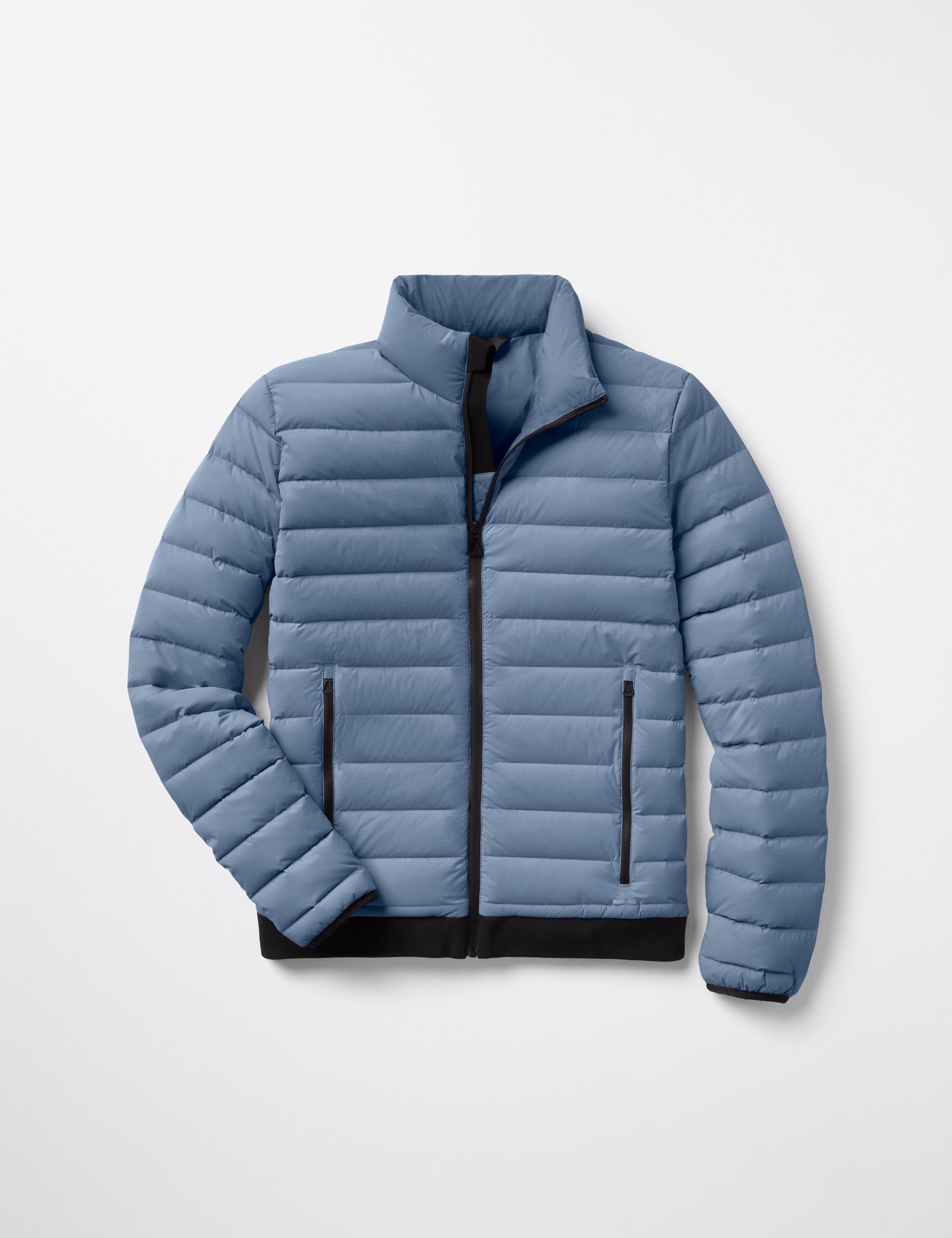 Studio laydown of Launch Full-Zip Jacket in Portal Blue