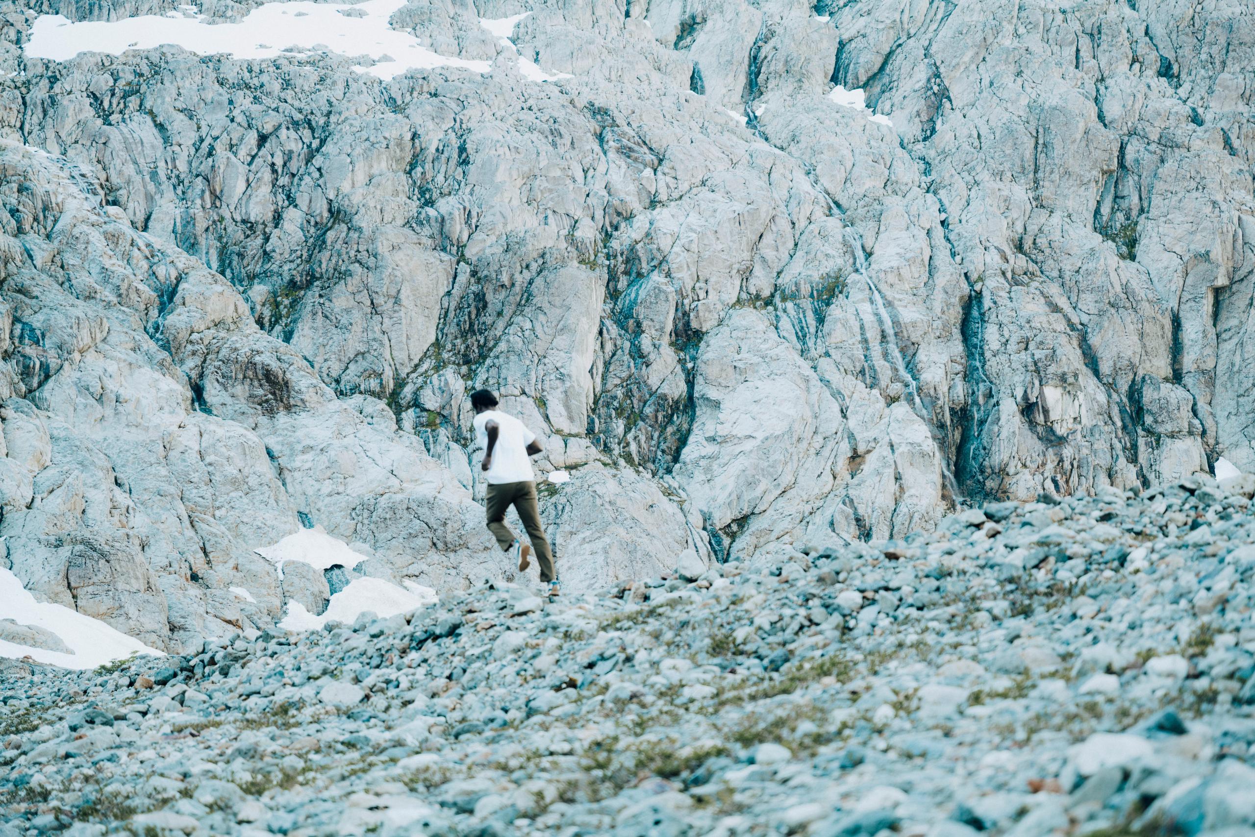  A man running on rocky ground