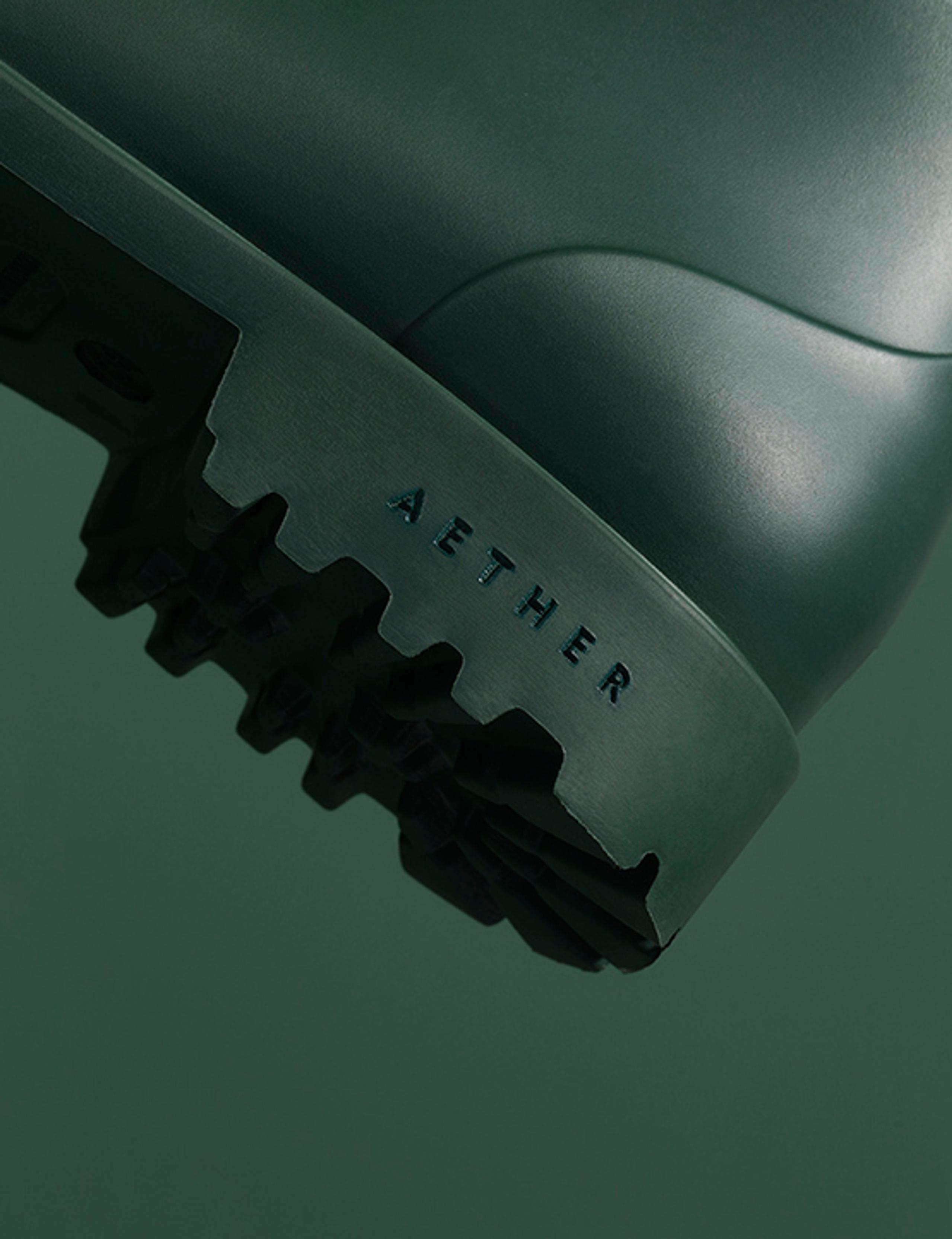 Detail of Rain Boot heel with debossed AETHER logo