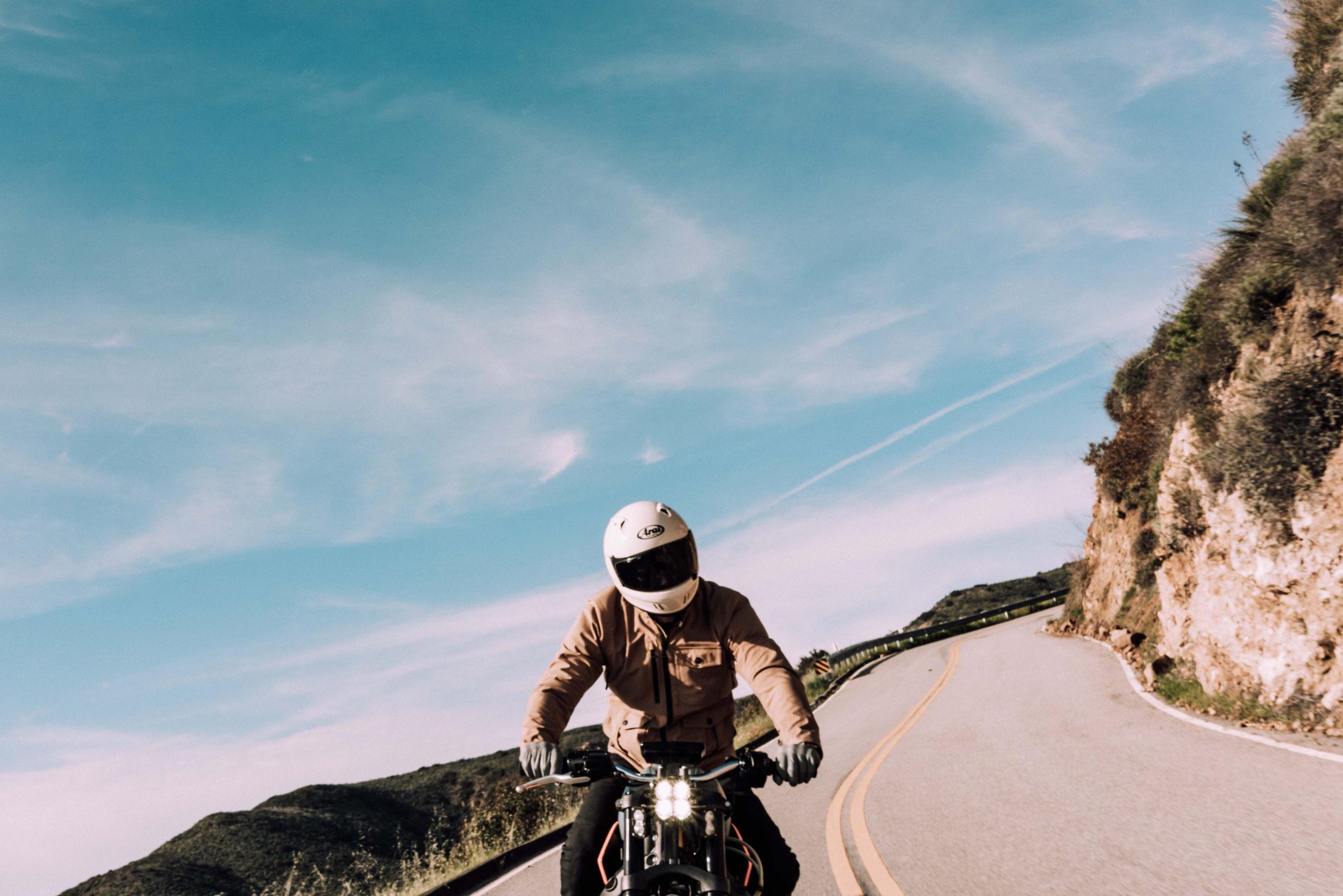 Man riding motorcycle Deer Creek Canyon