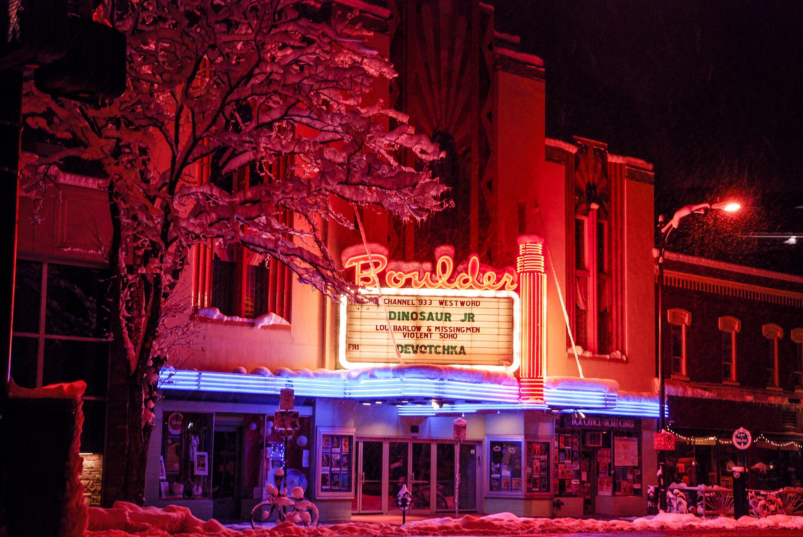 Exterior of Boulder Theater lit up at night