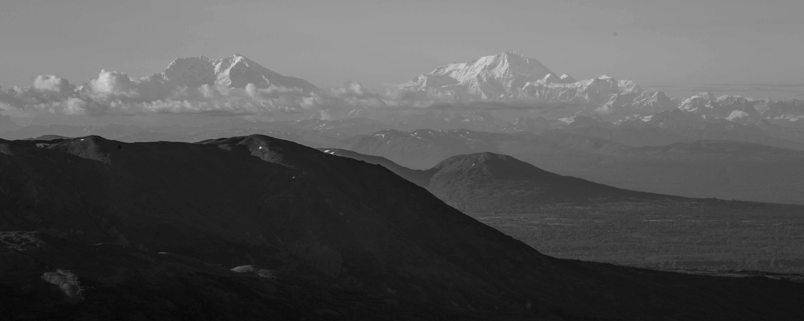 Black and white photo of Alaskan mountain landscape from aerial view