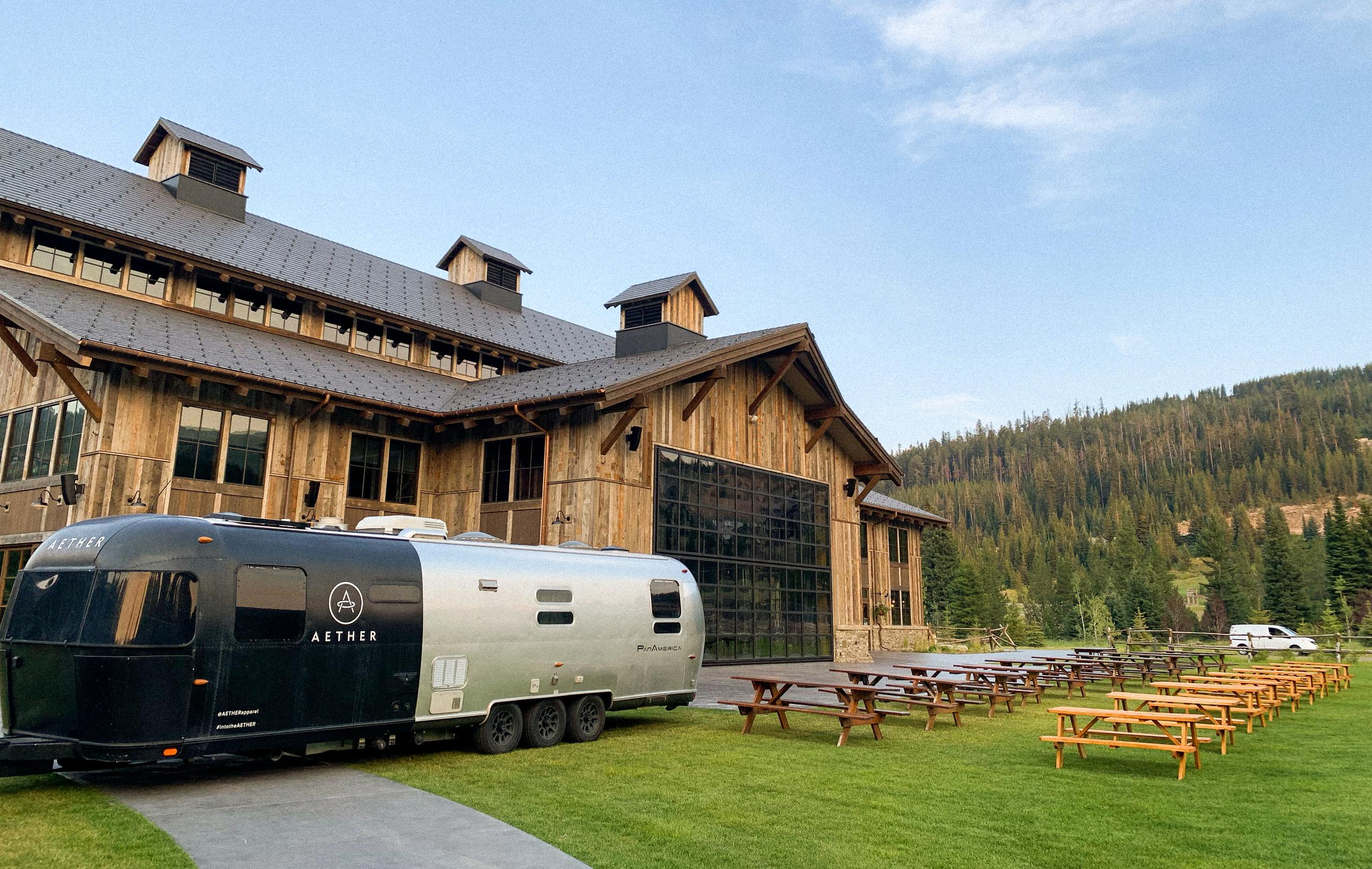 AETHERstream in front of building and forest in Big Sky, Montana