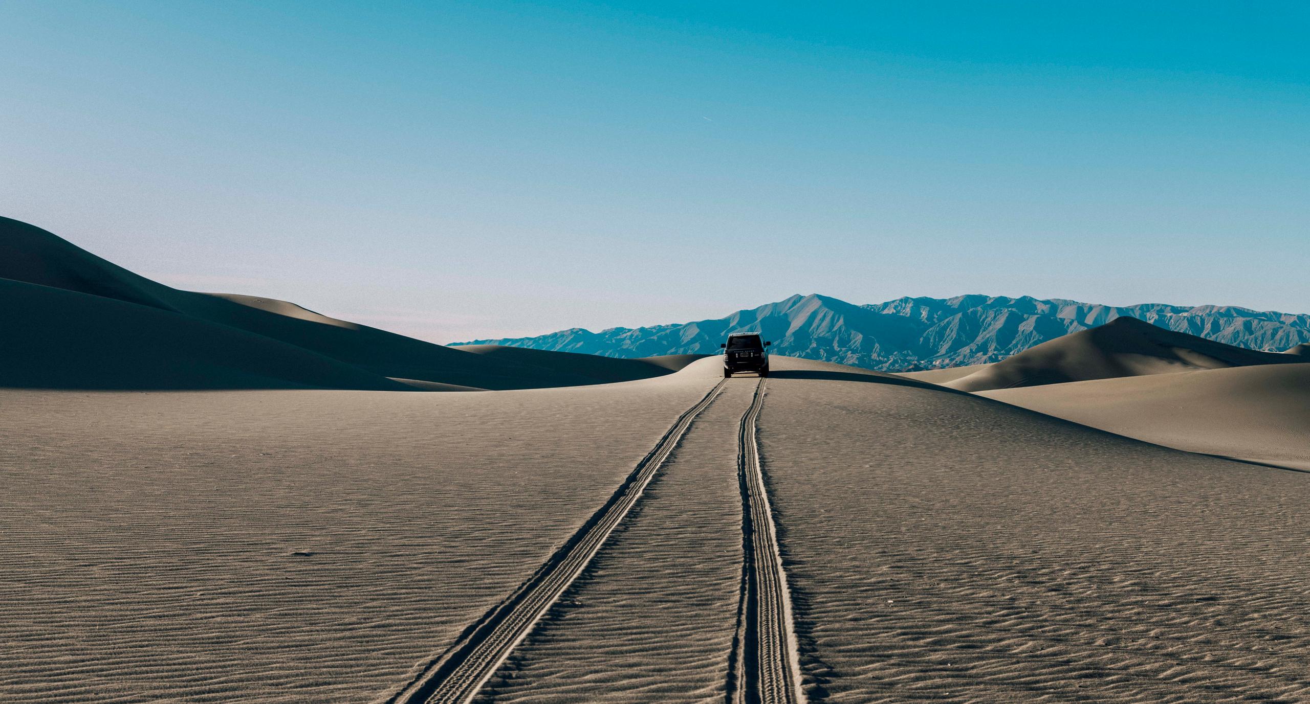 Car moving further in the desert