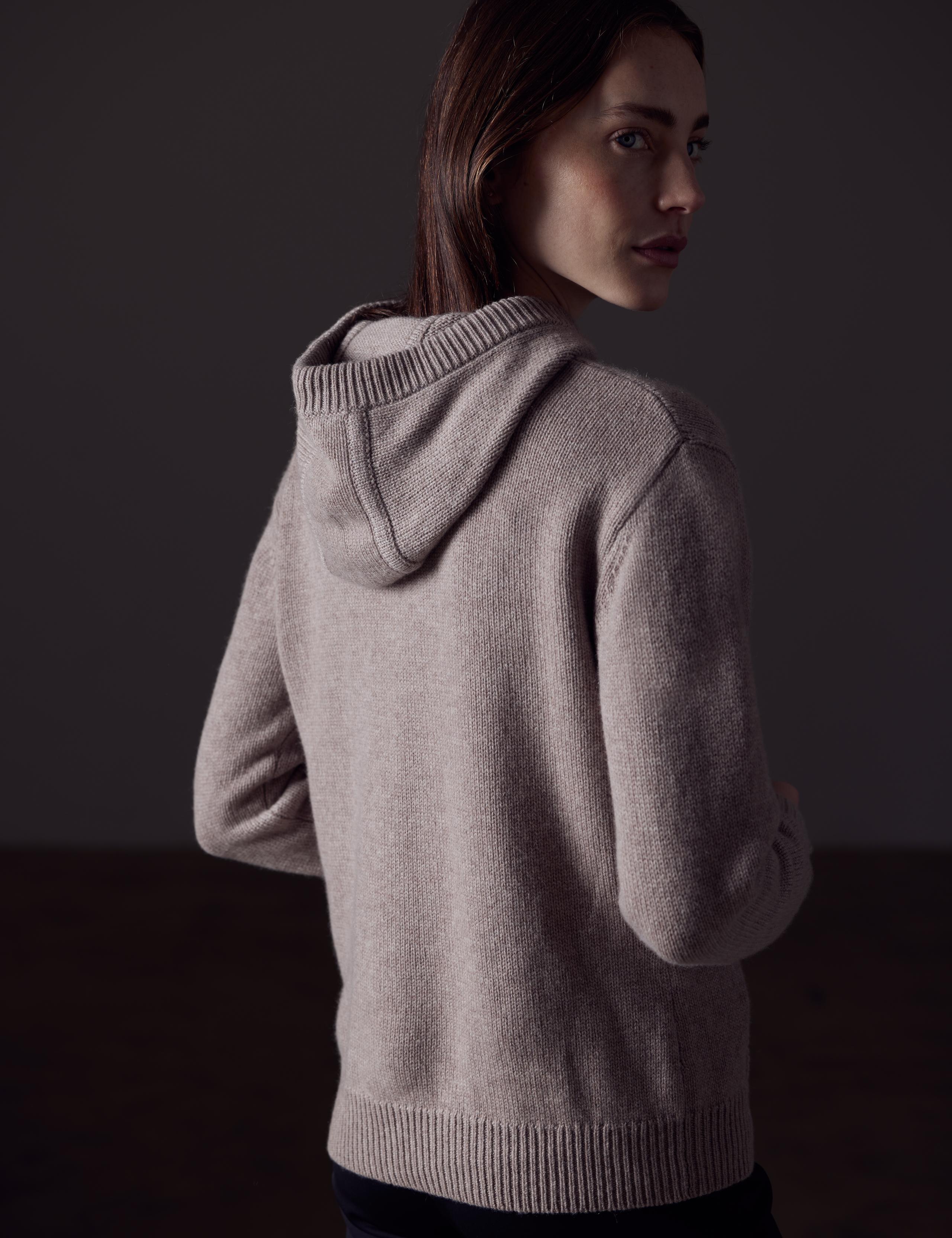 A woman in Ava Cashmere Hooded Sweater
