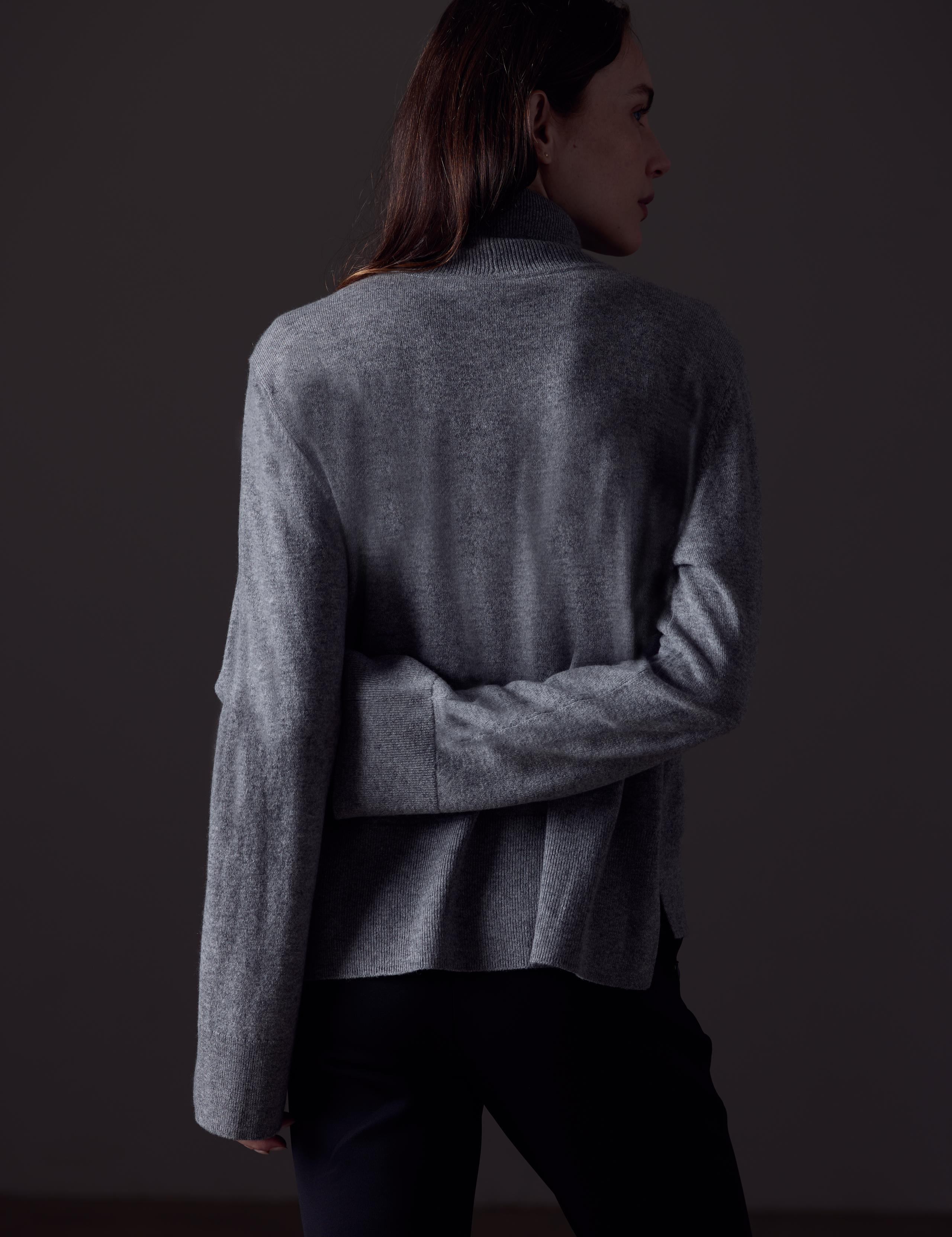 Woman wearing Leigh Cashmere Turtleneck Sweater.