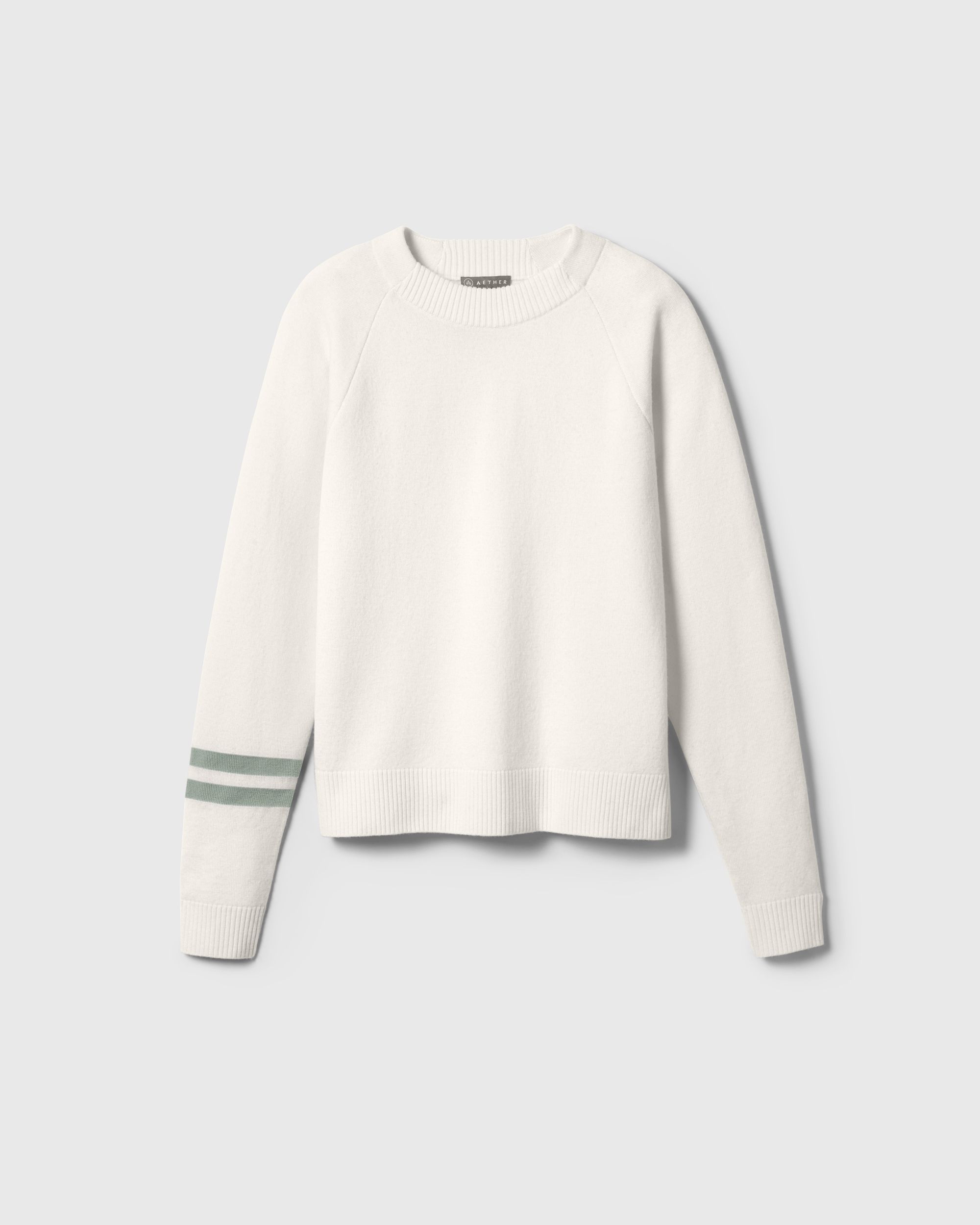 Woman wearing Racer Sweater 2.0 in Winter White