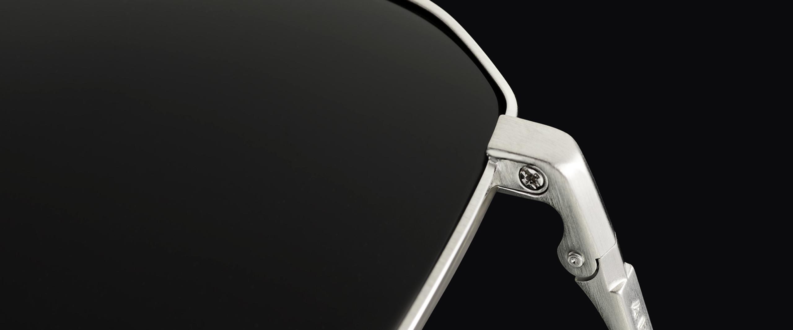 Close hinge and lens detail of Arches sunglasses