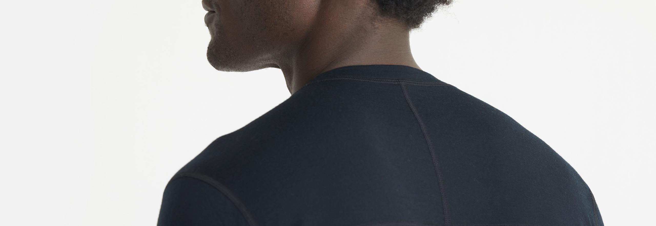 Closeup shoulder and neck detail of back of Premium Merino Base Layer Crew