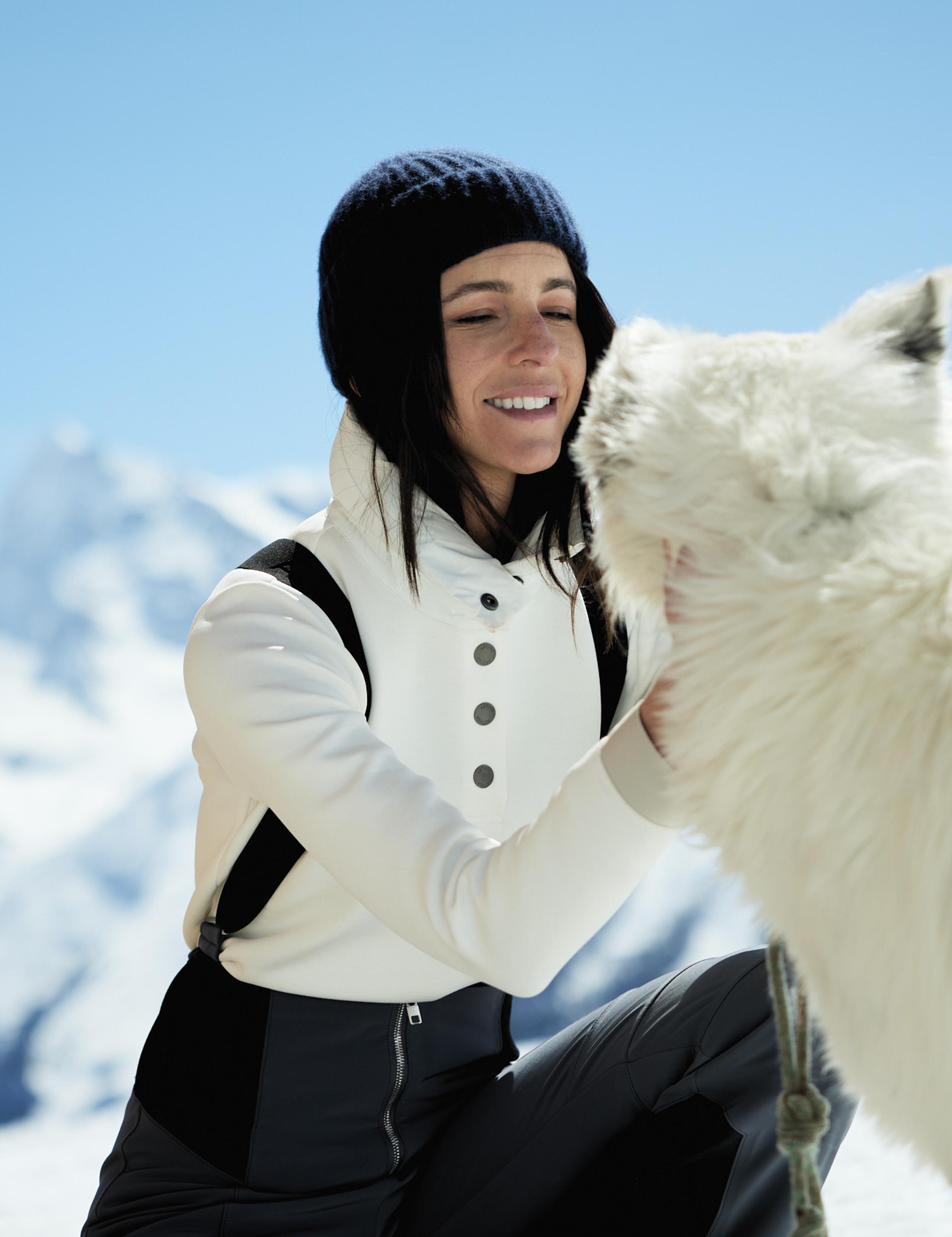 Women wearing Align Pullover with a dog