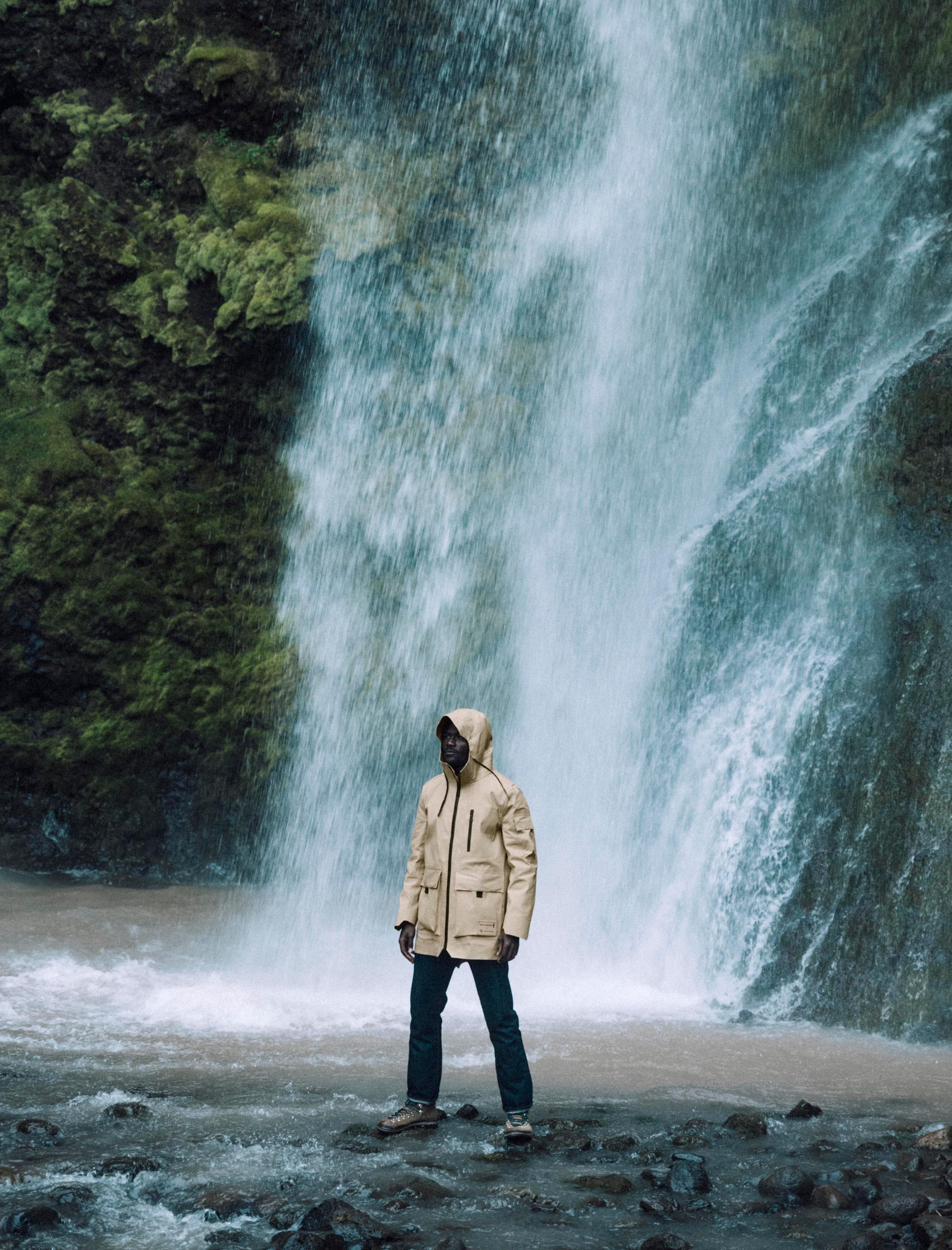 Remy wearing AETHER+Mackintosh Field Parka in Fawn.
