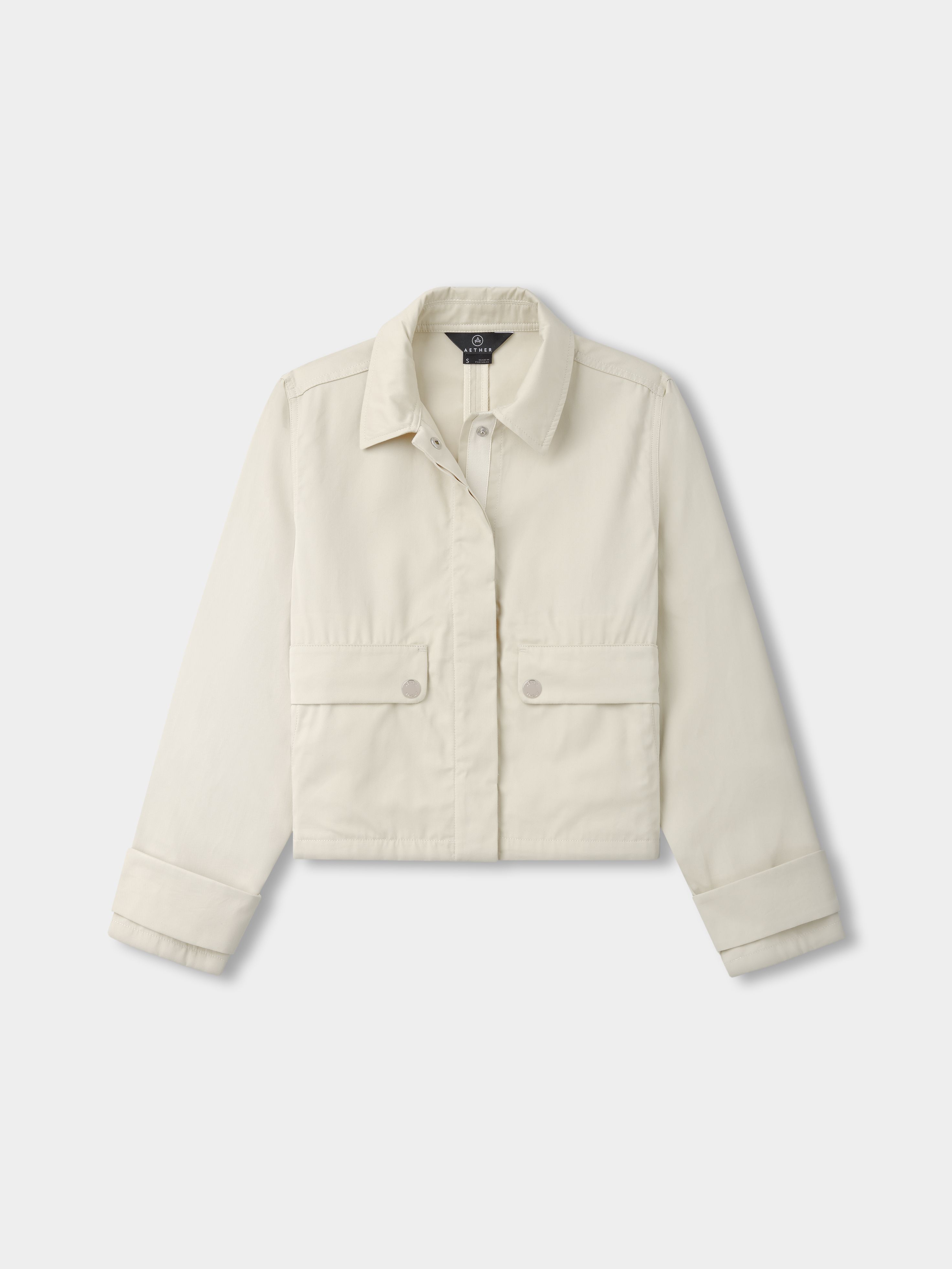 Flat lay of Raven Waxed Cotton Jacket in Bone