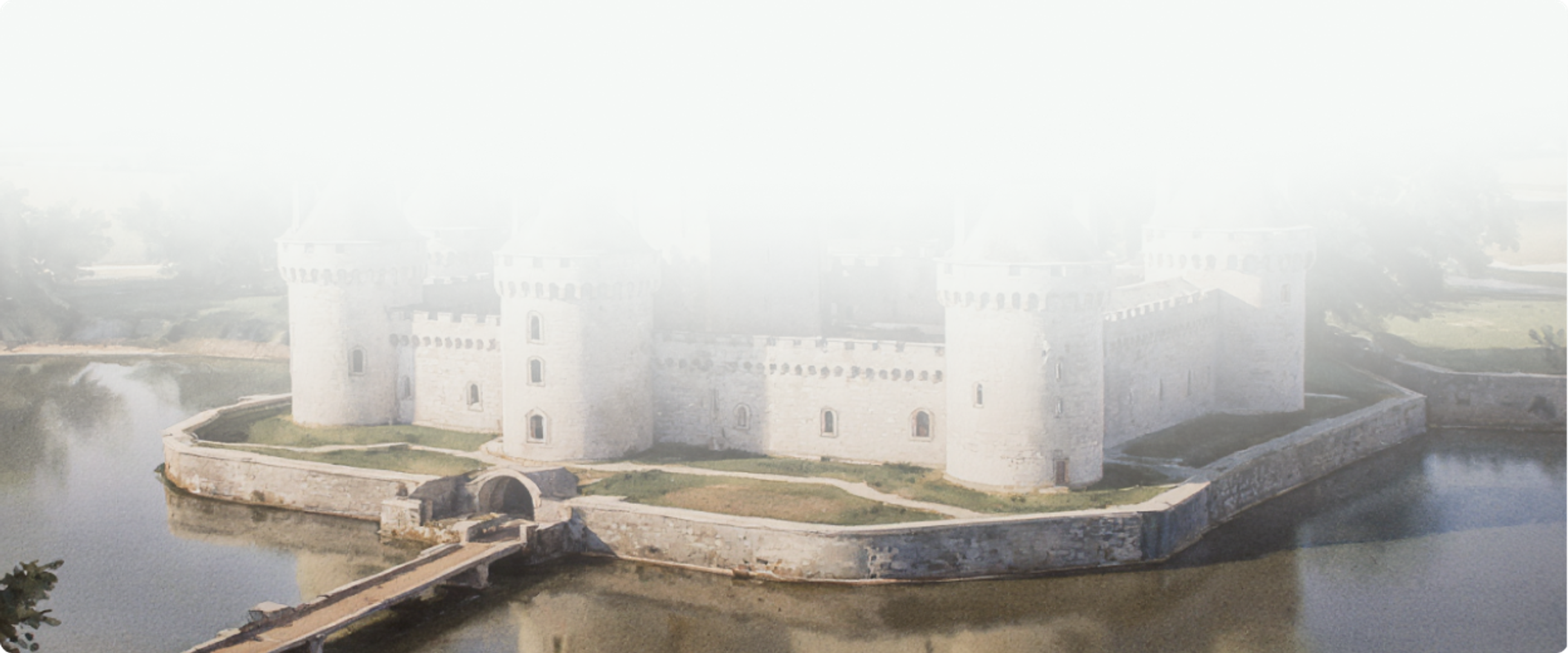 Scenic castle surrounded by water and mist