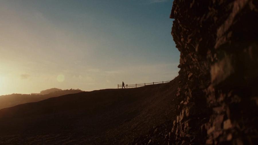 A hillside at sunrise, from the Cobot brand imagery
