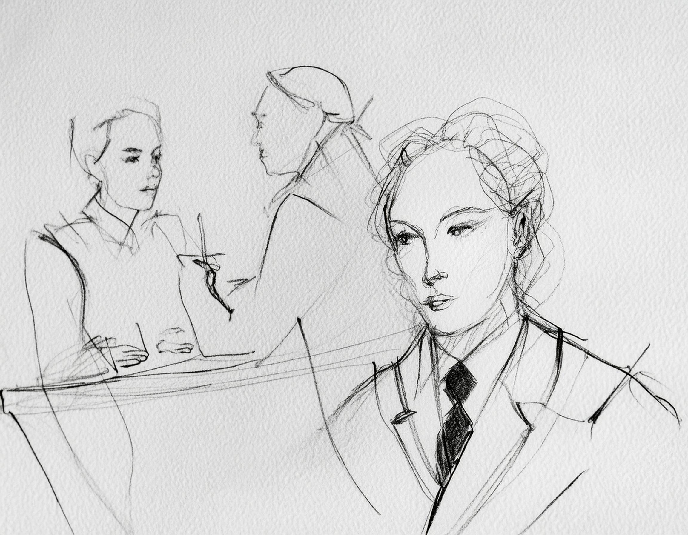 Mann ser bak på to stykker som snakker