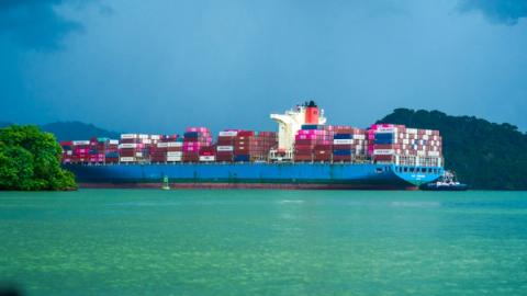 a cargo ship passing the panama canal in panama city