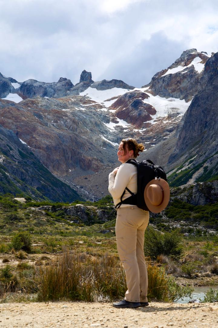woman hiking to laguna esmeralda in ushuaia, agentina