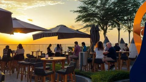 people drinking and relaxing while watching the sunset at Mr.Stork in Singapore