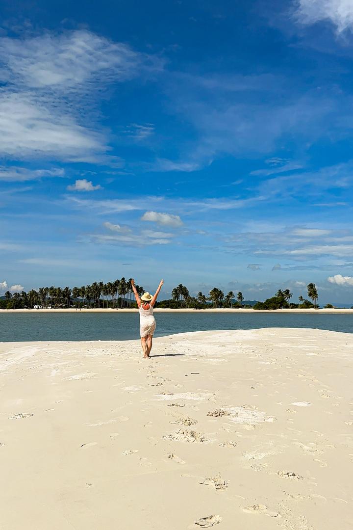 woman walking on the beach in Koh Yao Yai, thailand