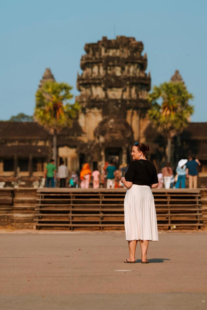 woman standing in front of angkor wat in Siem reap, Cambodia
