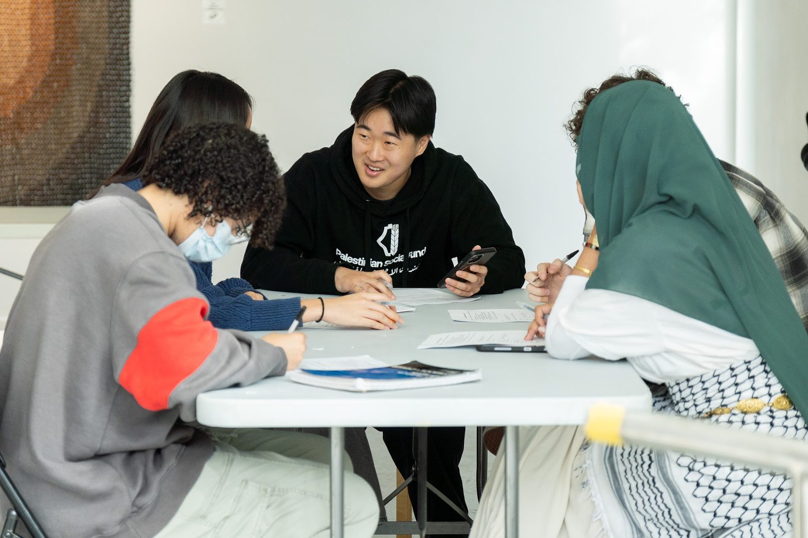 Organizers having a discussion in a workshop