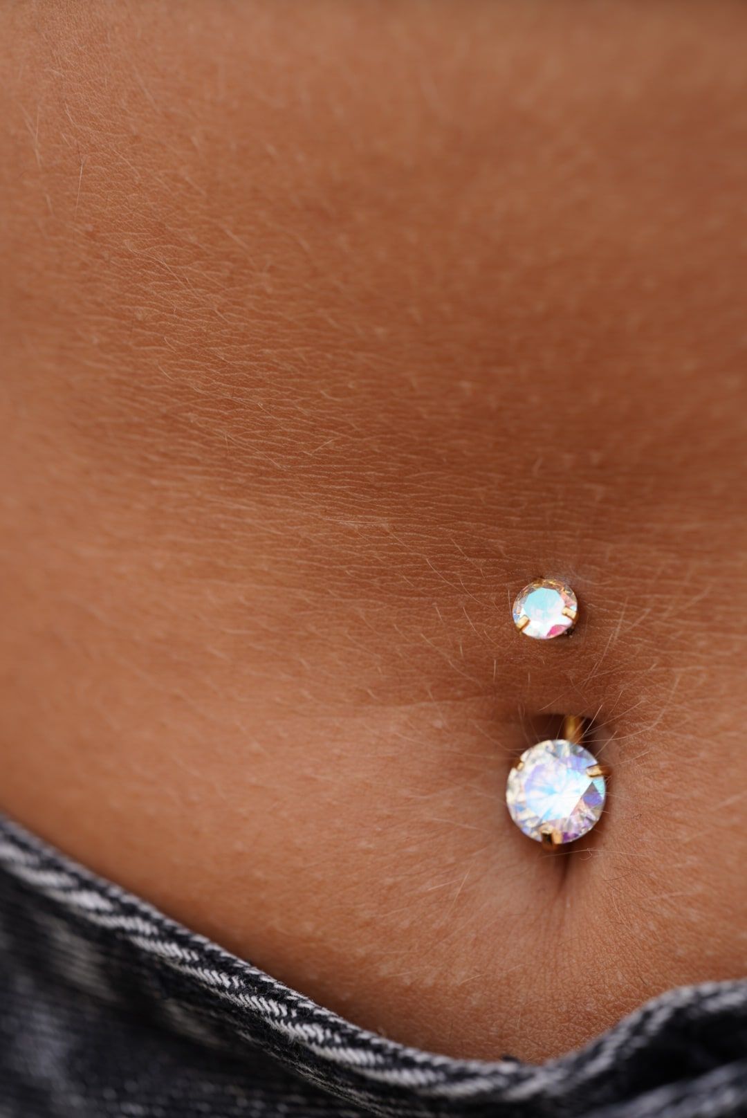Piercing pupku