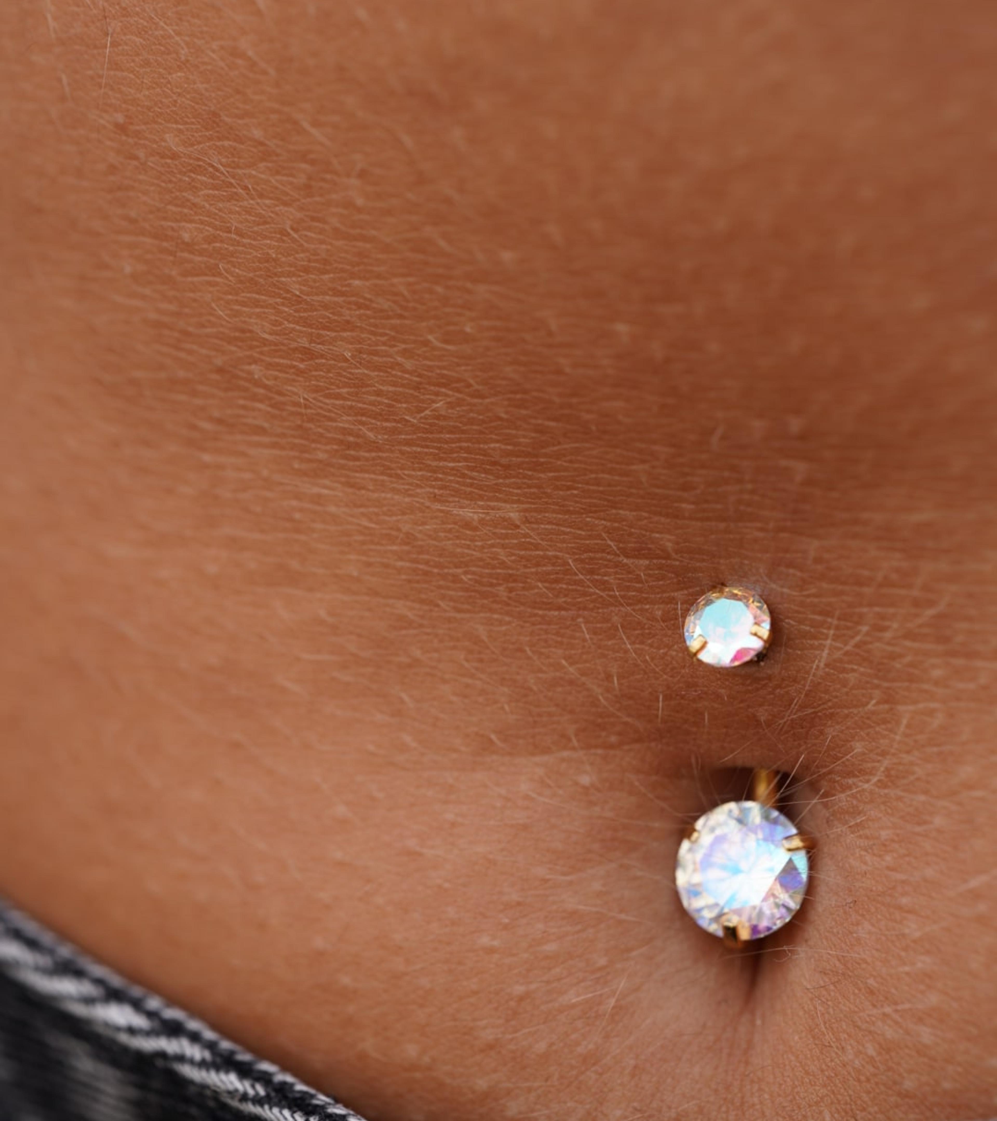 Piercing pupku