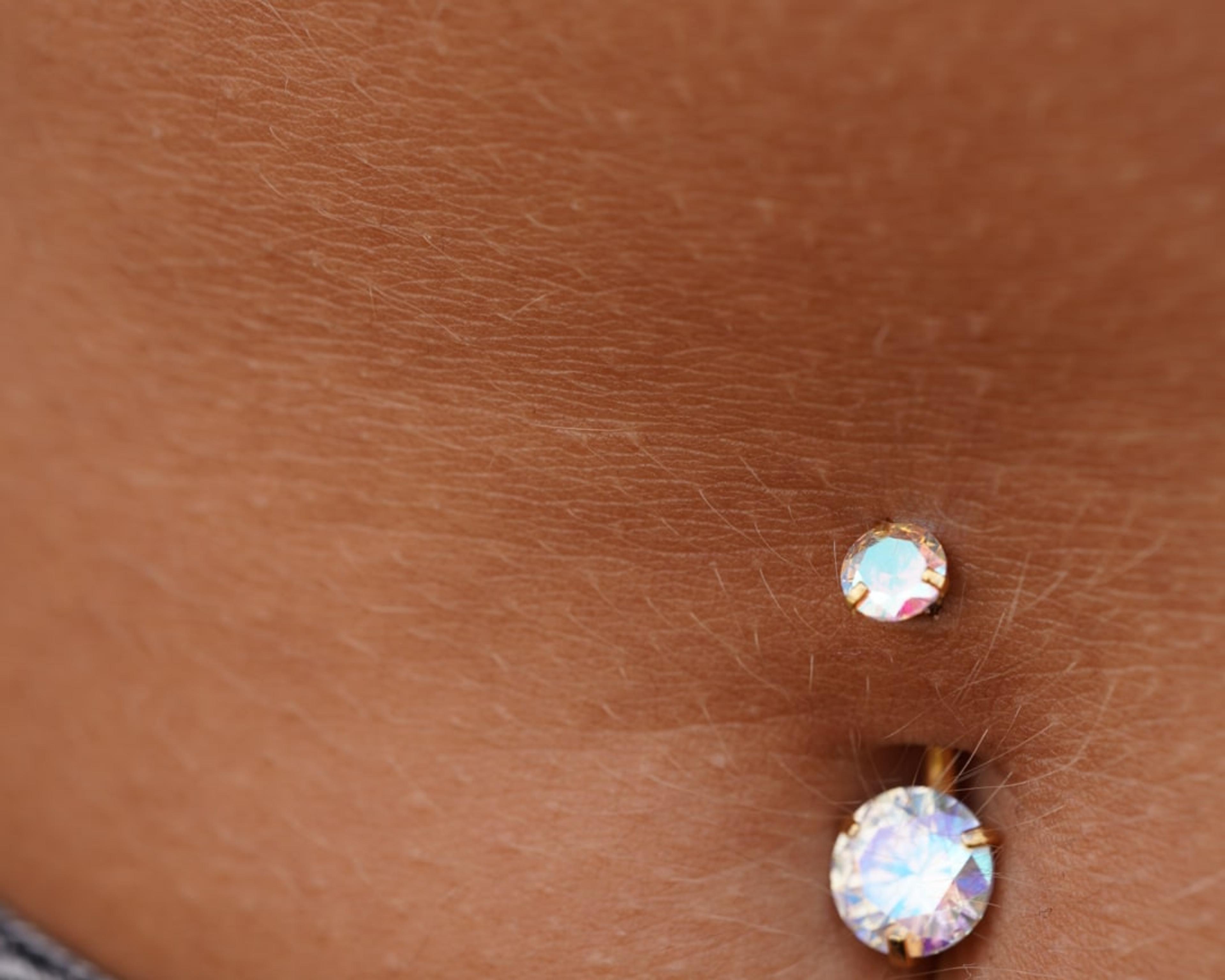 Piercing pupku