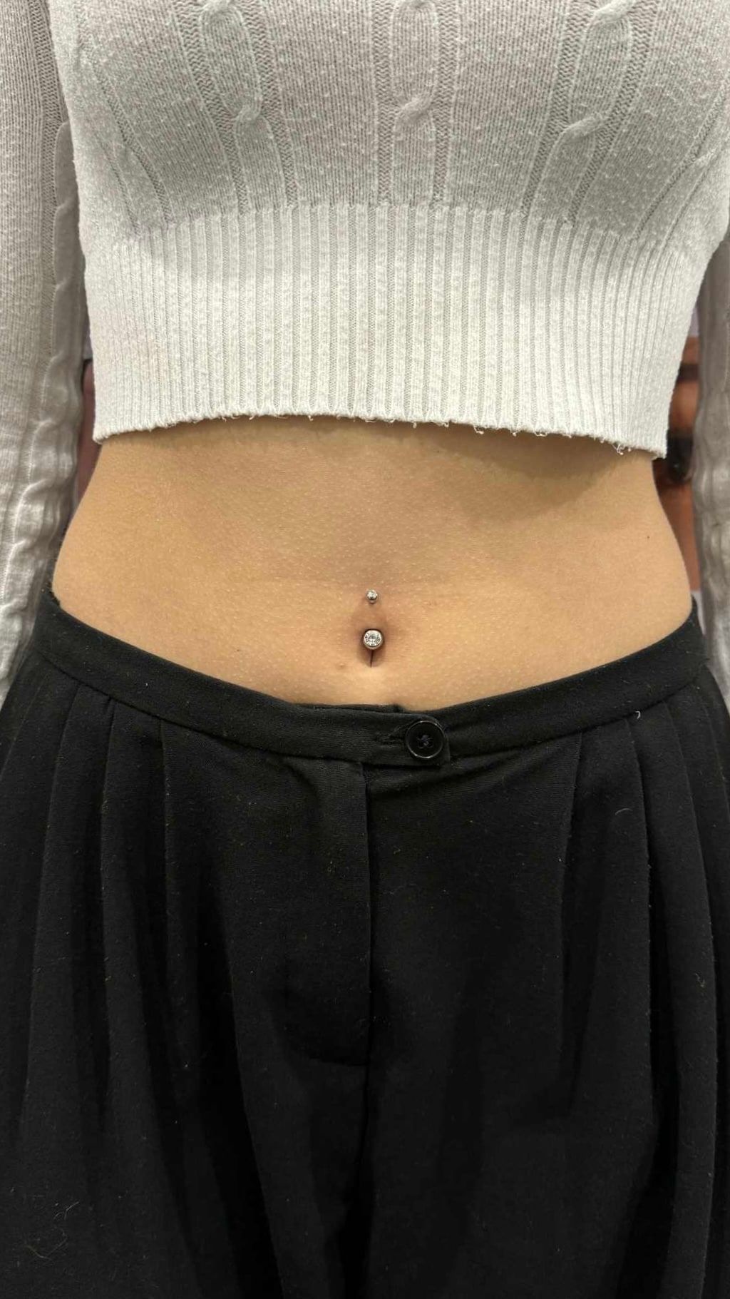 Piercing pupku