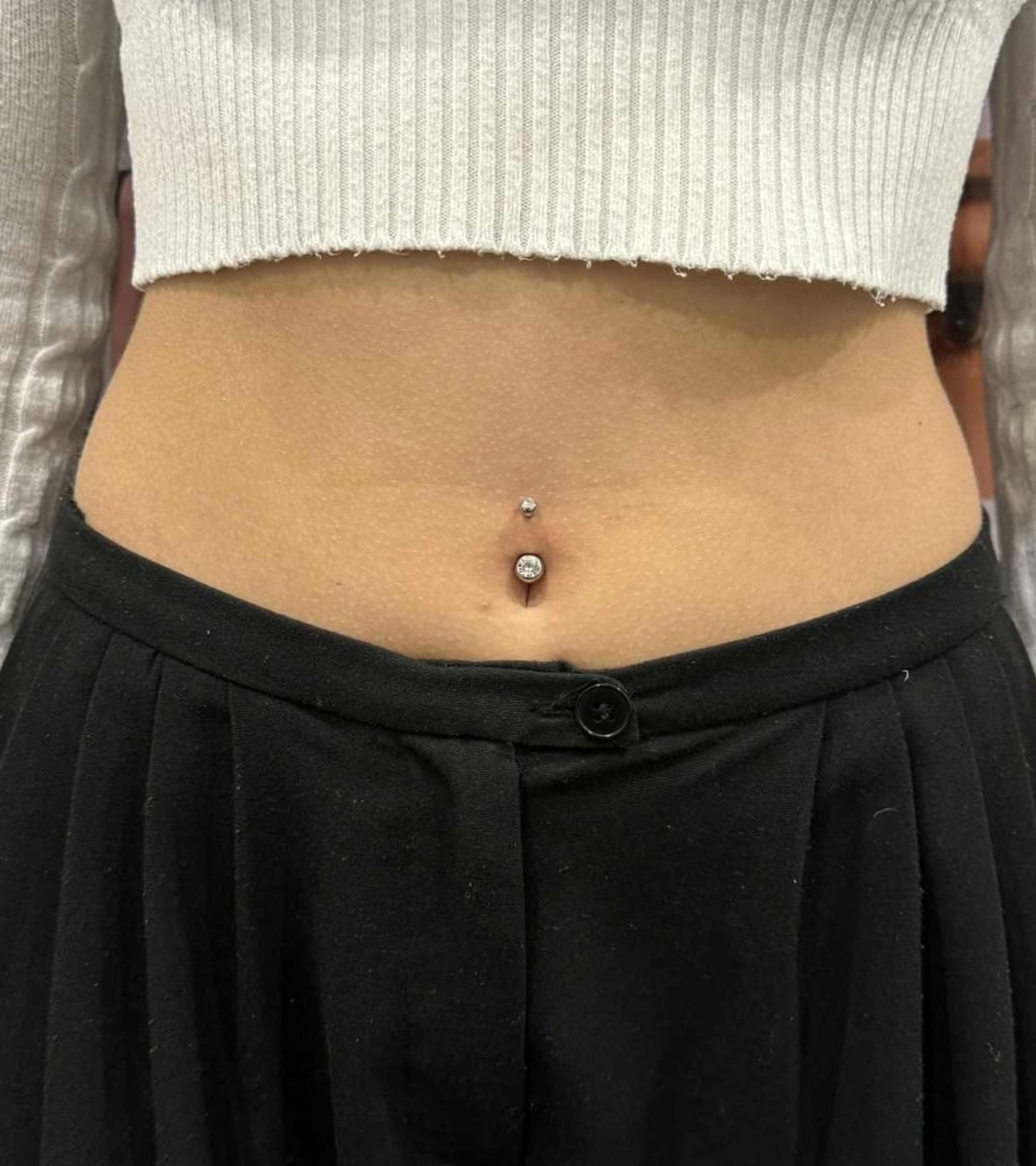 Piercing pupku