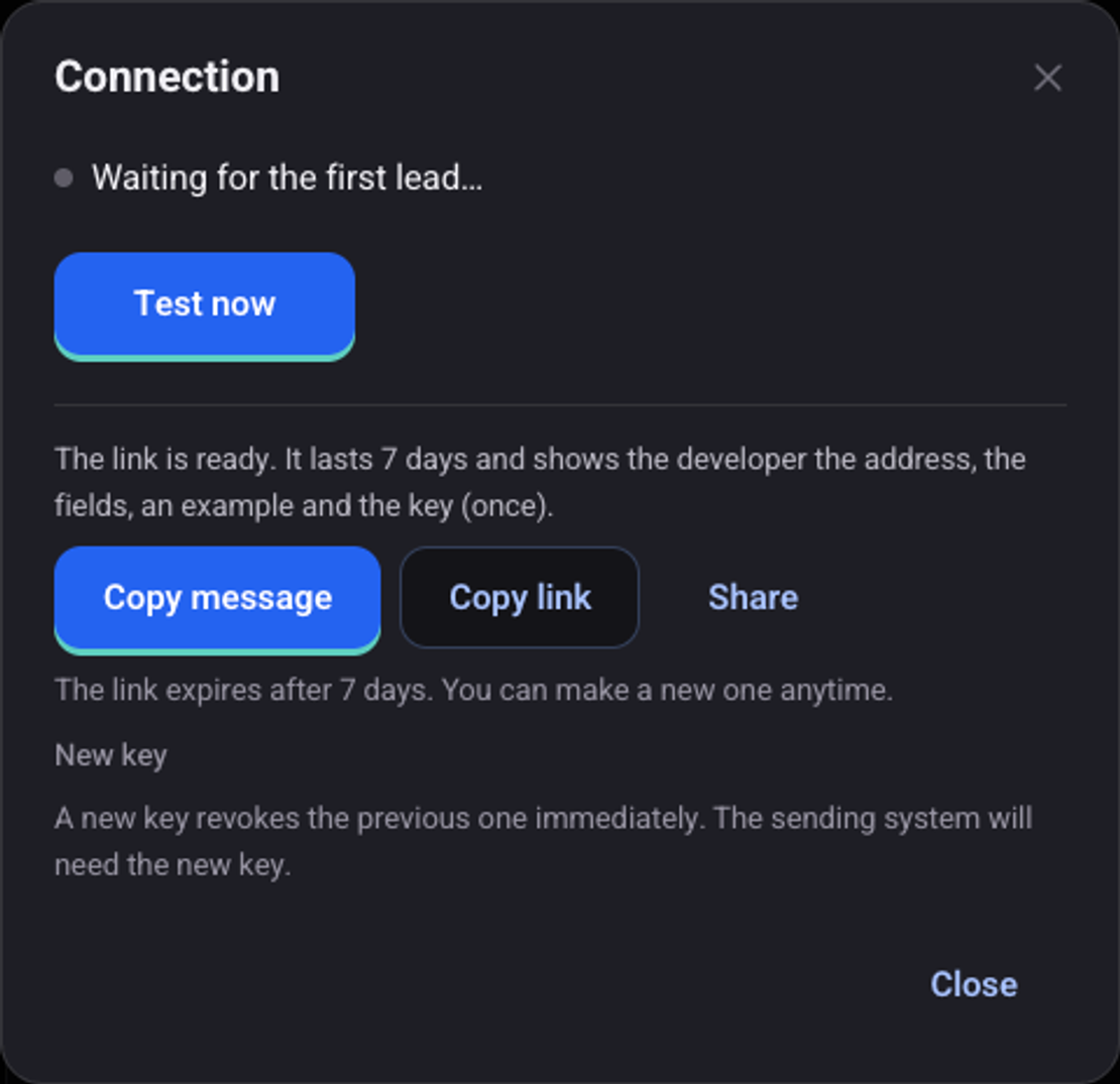 The Connection window after creating a new key: the link shows the developer the address, the fields, an example and the key once