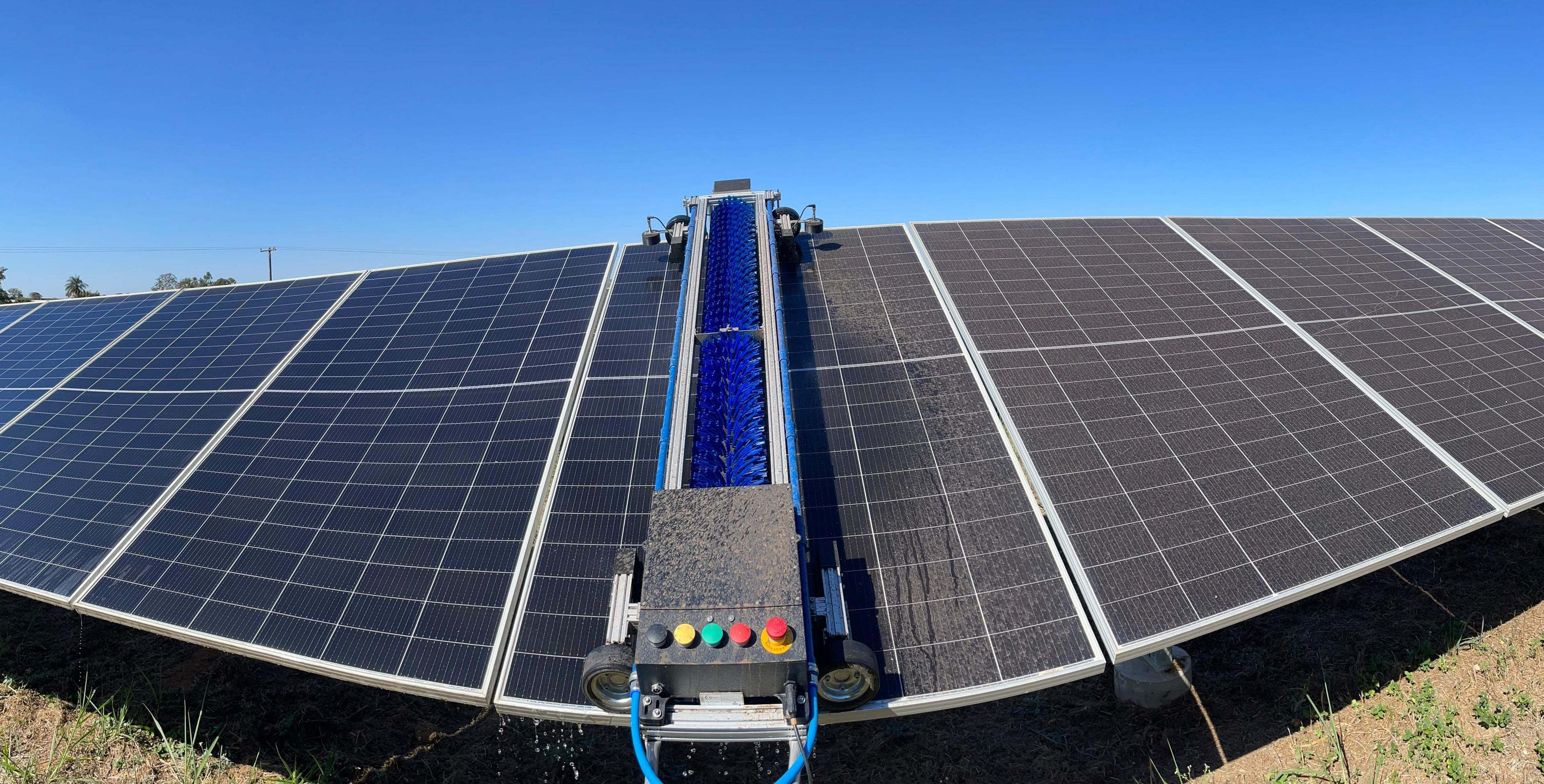 TCR-W1 autonomous robot cleaning photovoltaic modules at a solar plant.