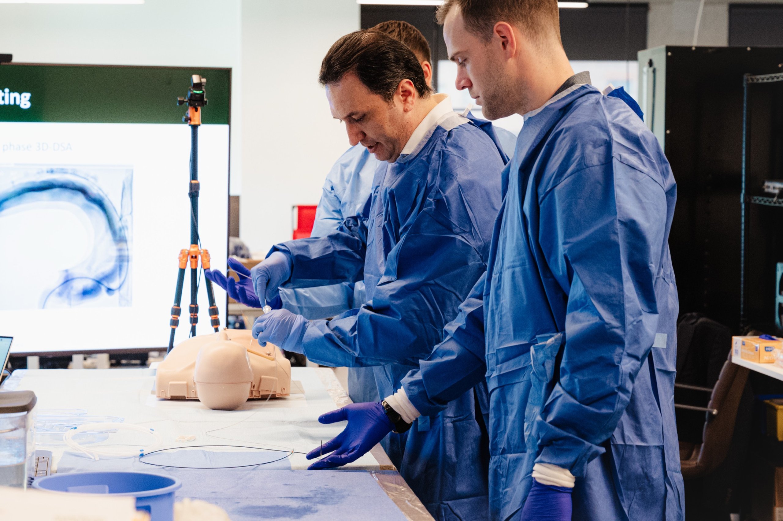 Synchron's team rehearsing the procedure on a model in the lab.