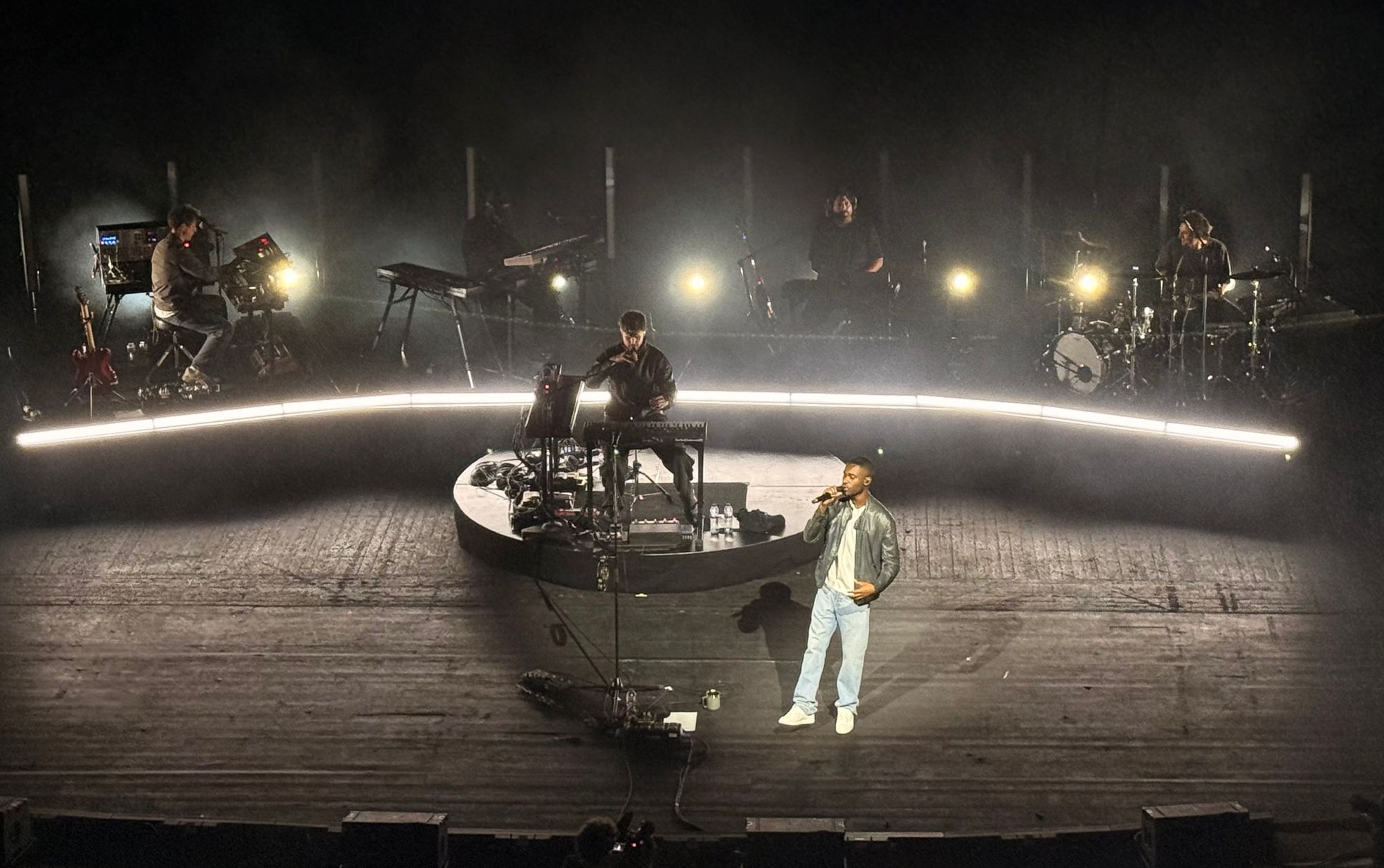James Blake behind keyboard with rapper Dave