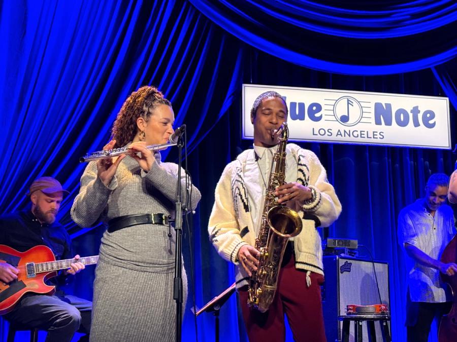 left to right: guitarist in back, Elena Pinderhughes on the flute and saxophonist on the right