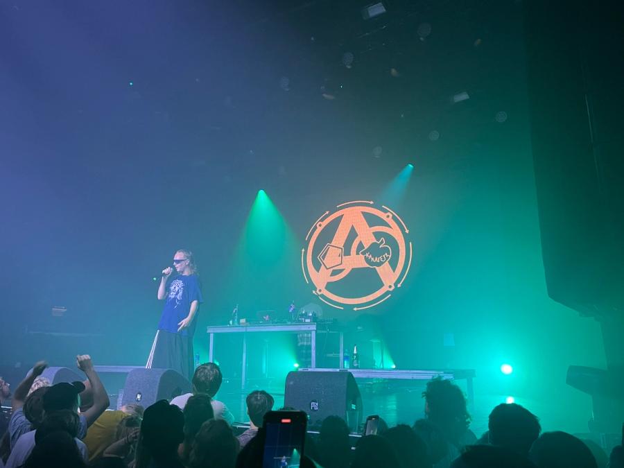 abel rapping with anarchy sign behind