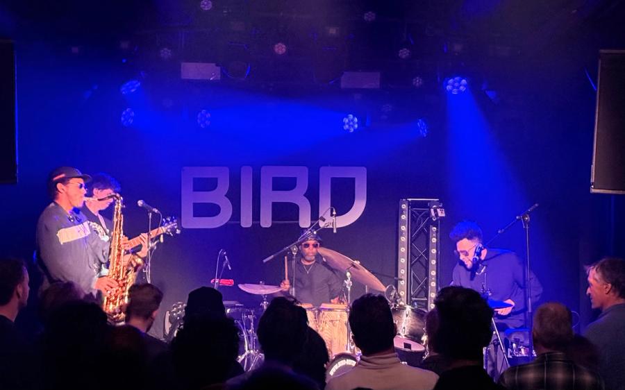 kassa on drums on the right, there is also a saxophonist, bass player and percussionist