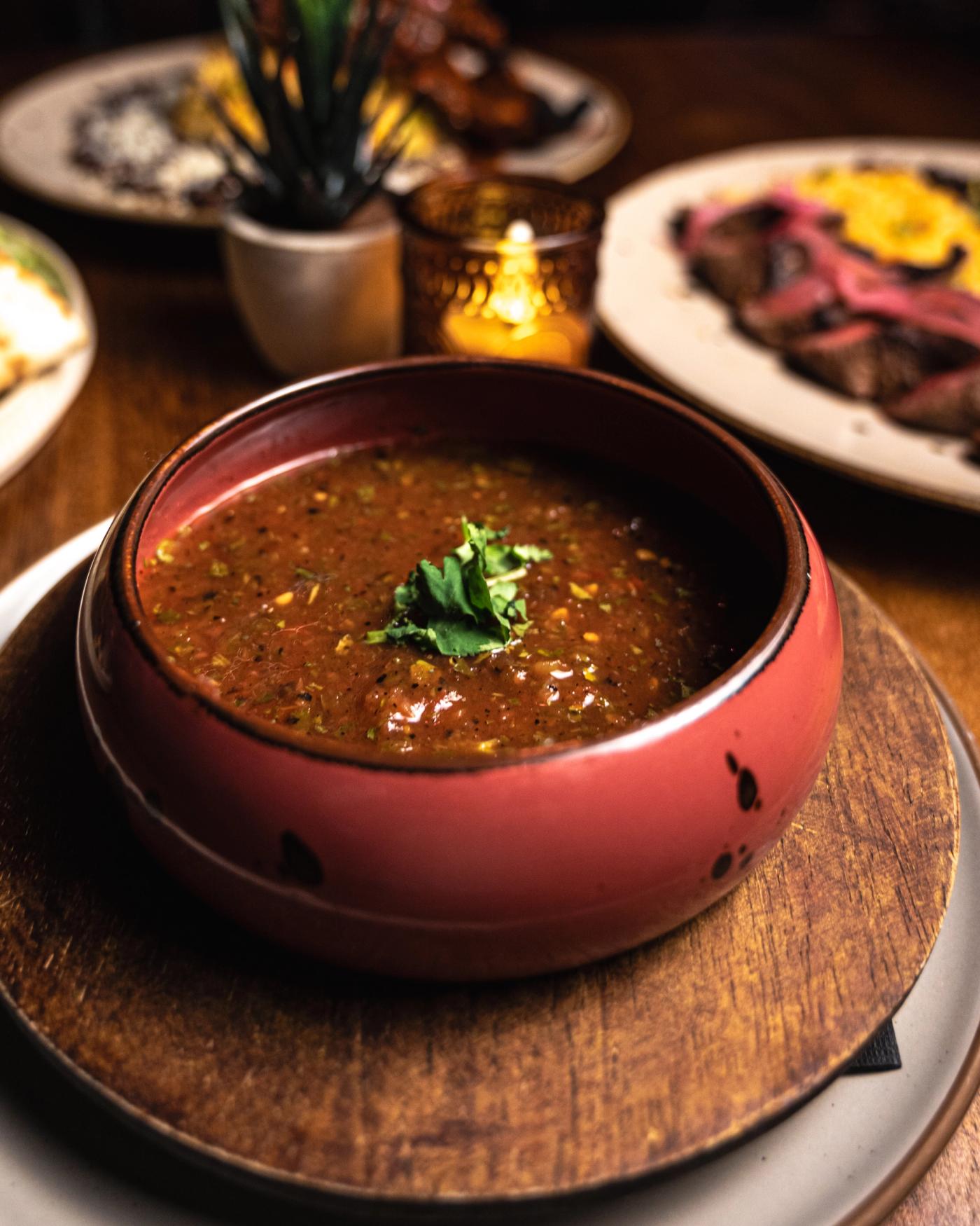 Salsa madre in a red bowl at Cantina Añejo