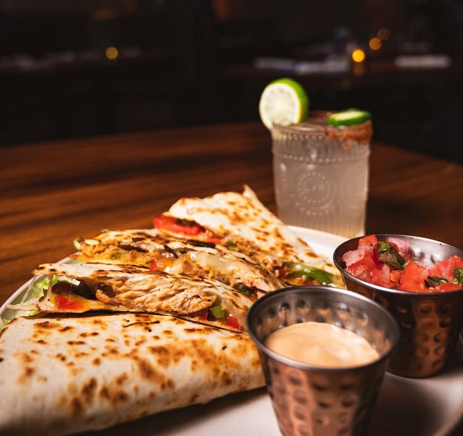 Chicken quesadilla with pico de gallo, crema and a margarita at Cantina Añejo