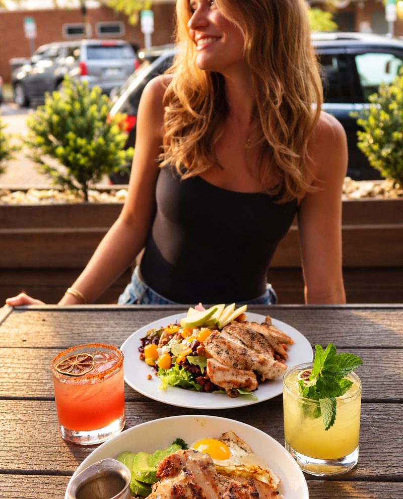Patio lunch with salads, eggs and cocktails