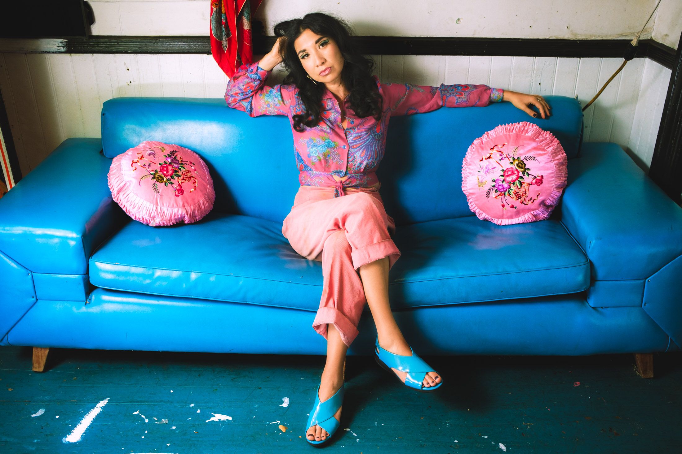 Ruby Mountain posing in vintage fashion as a singer in Oakland.