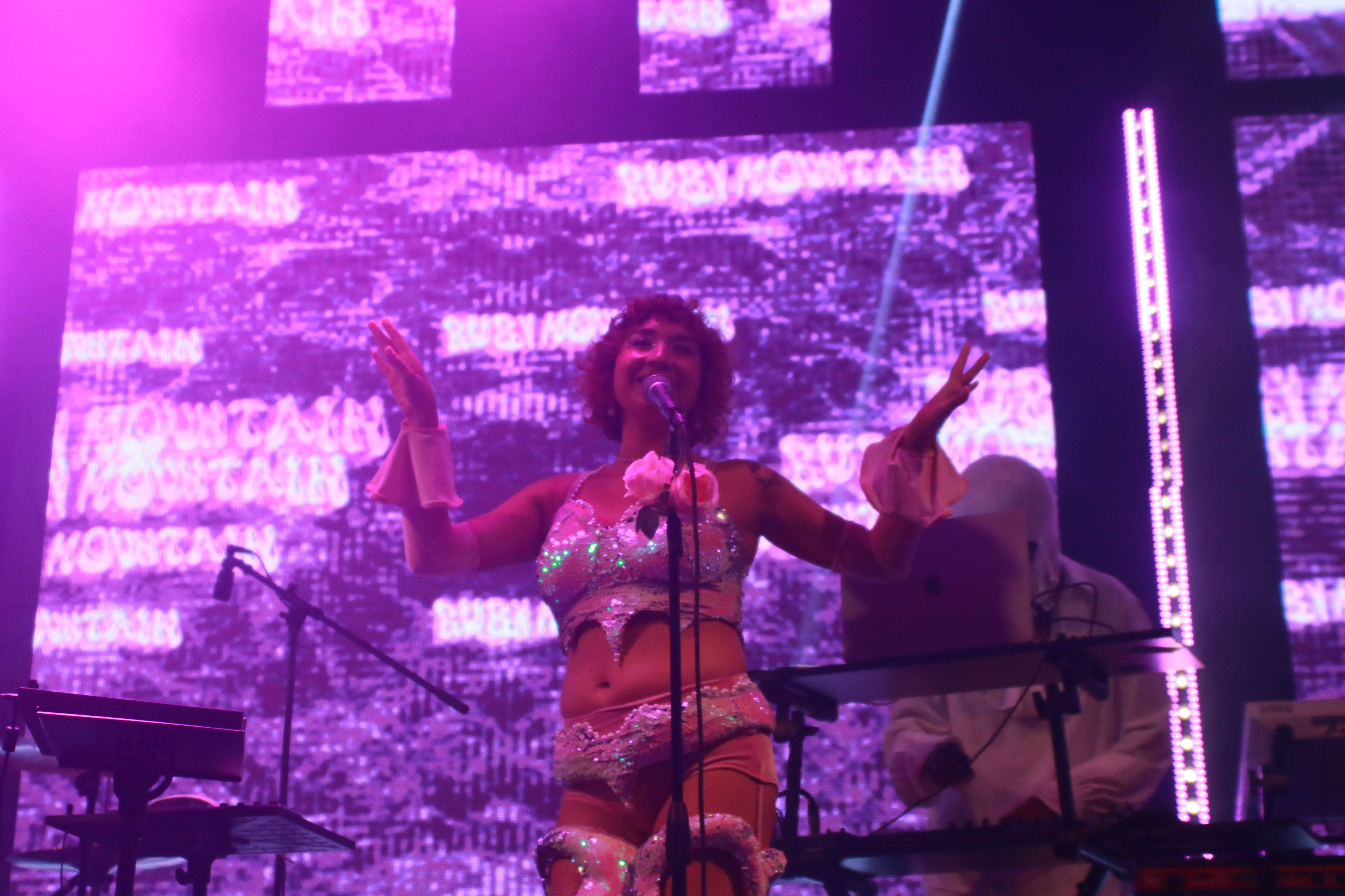 Ruby Mountain performing live in Hollywood, singing and producing dance music with a cosmic vibe from Venus.