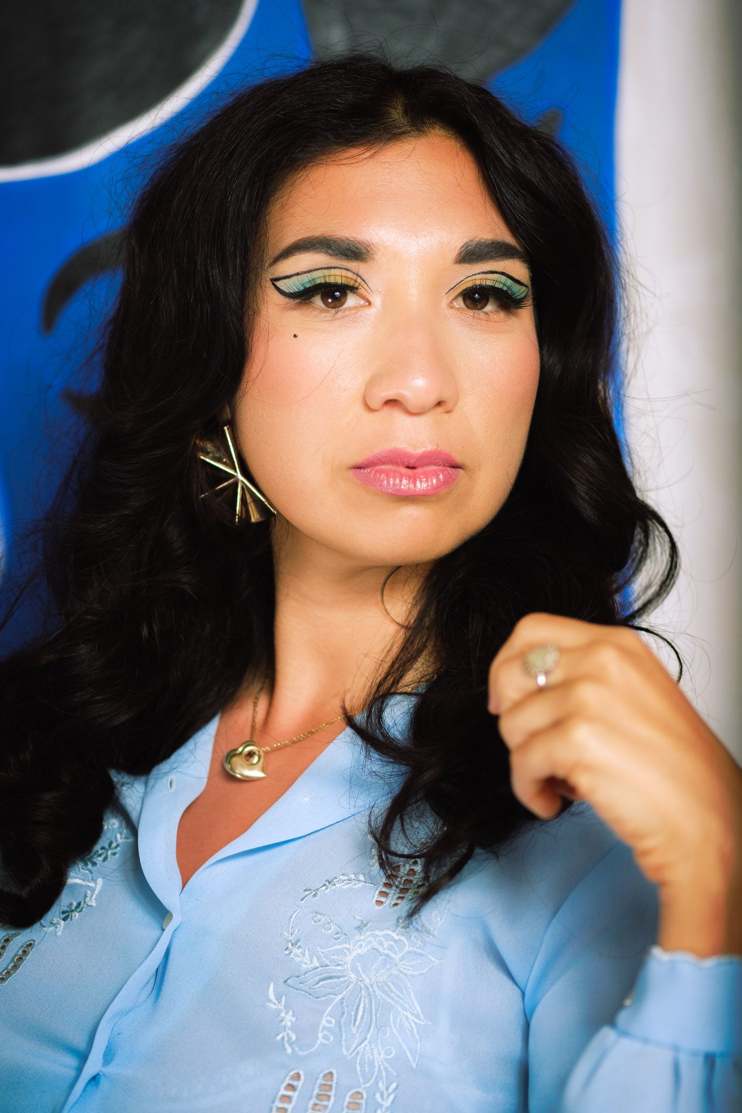 Ruby Mountain posing in vintage fashion as a singer in Oakland.