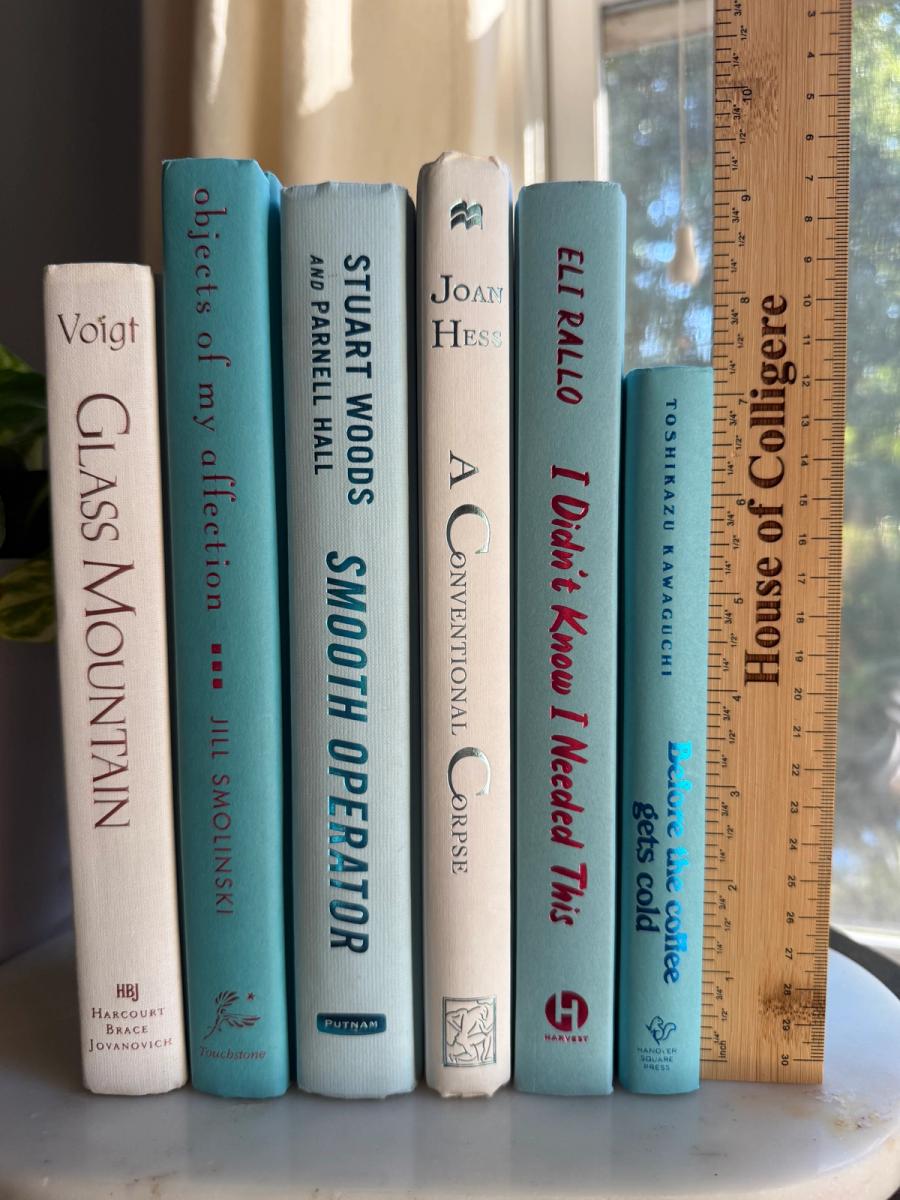 Curated collection of soft blue, aqua, seafoam, and muted coastal-toned books.