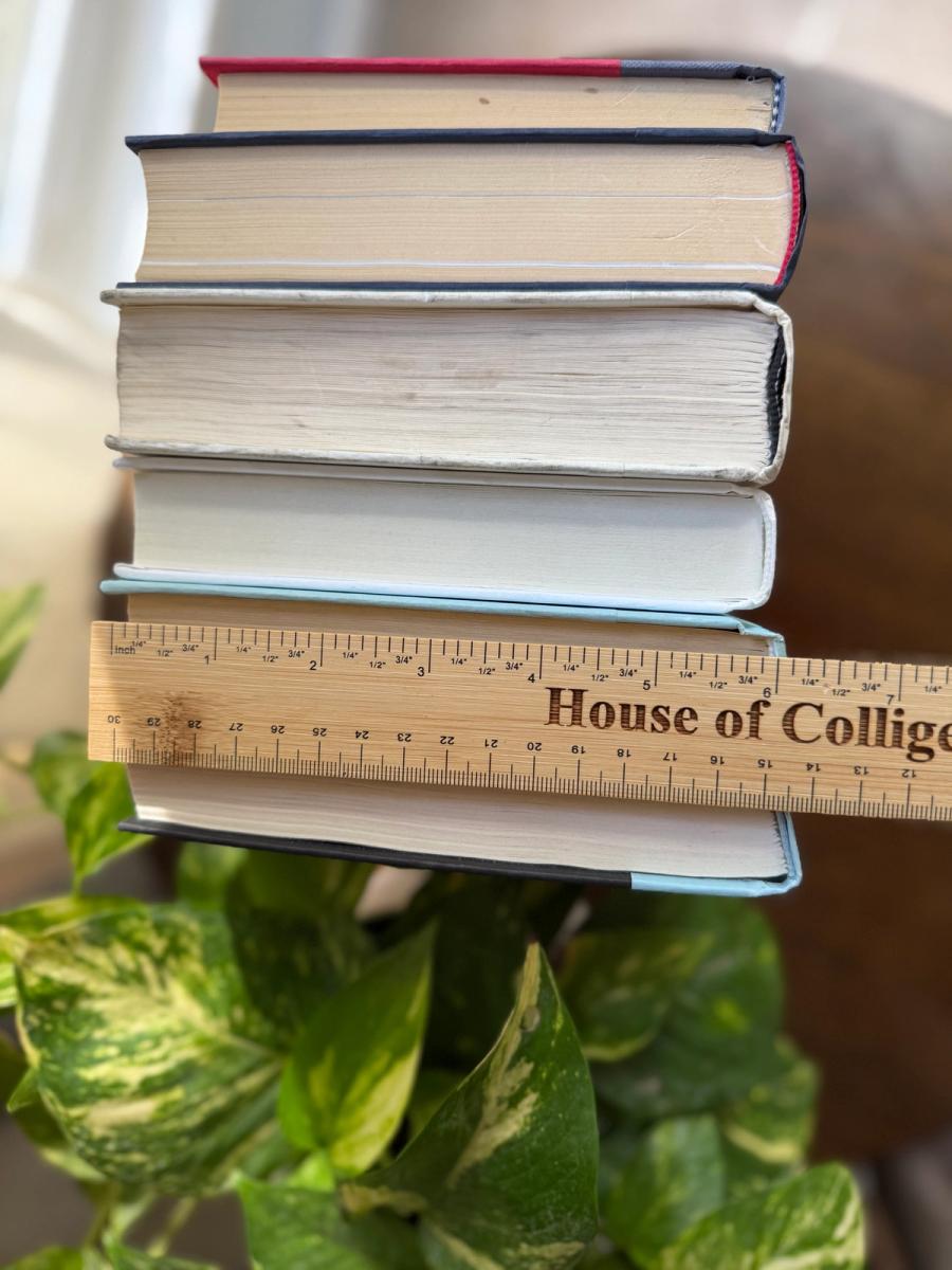 Curated collection of layered blue books ranging from pale coastal blue to deeper ocean tones.