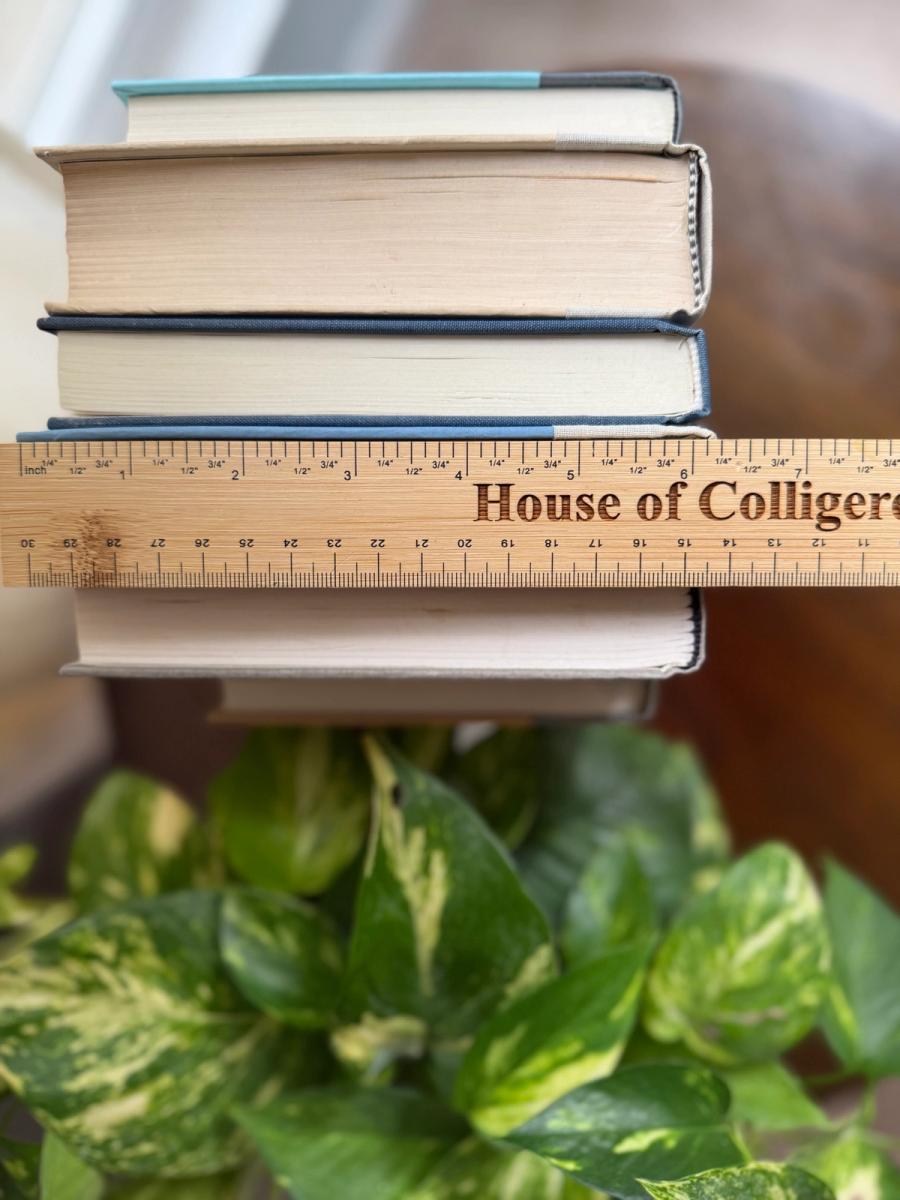 Curated collection of muted blue-gray, slate, charcoal, and softly weathered neutral books.