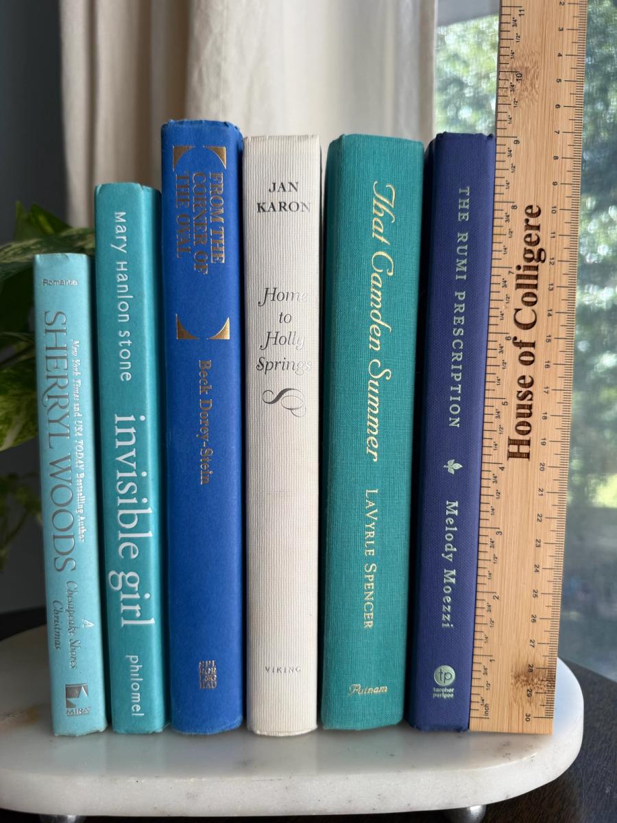 Curated collection of soft blue, aqua, seafoam, and muted coastal-toned books.