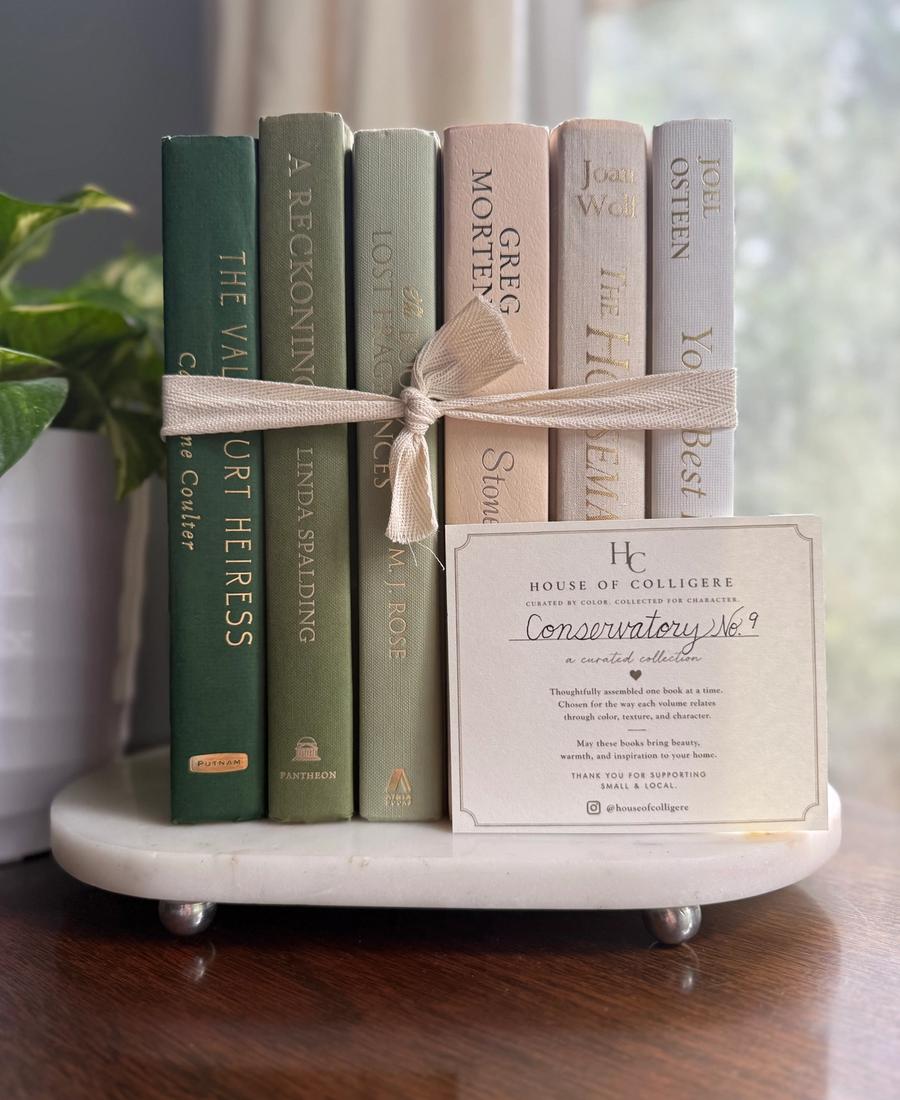 Curated collection of green books ranging from soft sage and olive to deeper botanical tones.