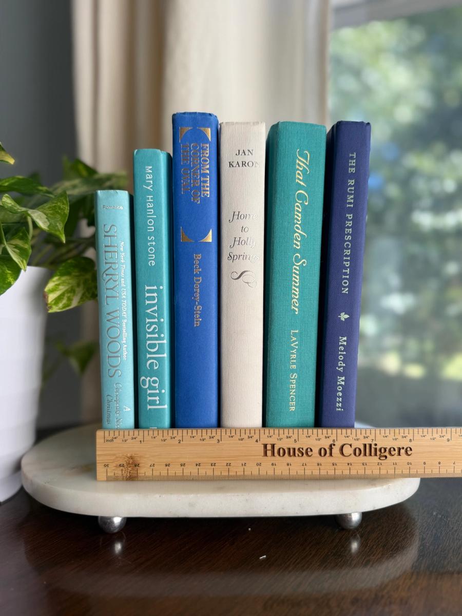 Curated collection of soft blue, aqua, seafoam, and muted coastal-toned books.