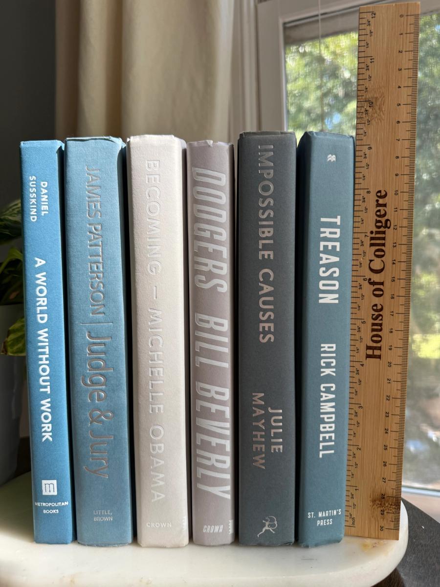 Curated collection of muted blue-gray, slate, charcoal, and softly weathered neutral books.